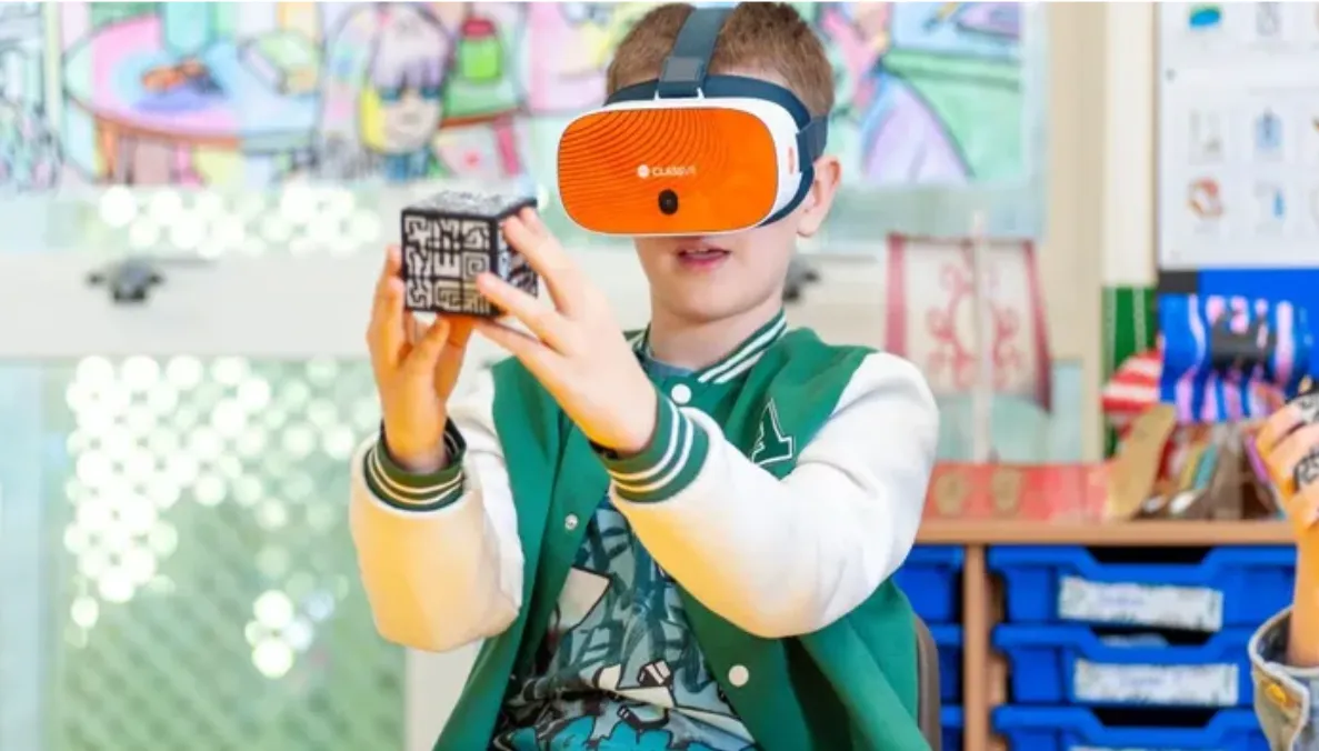 a child wearing VR headset in a classroom setting