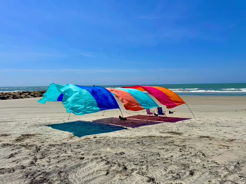 Rent a Shibumi Shade for the Perfect Beach Day in Ocean Isle Beach, NC &amp; Sunset Beach, NC. Same Day Delivery &amp; Easy Booking!