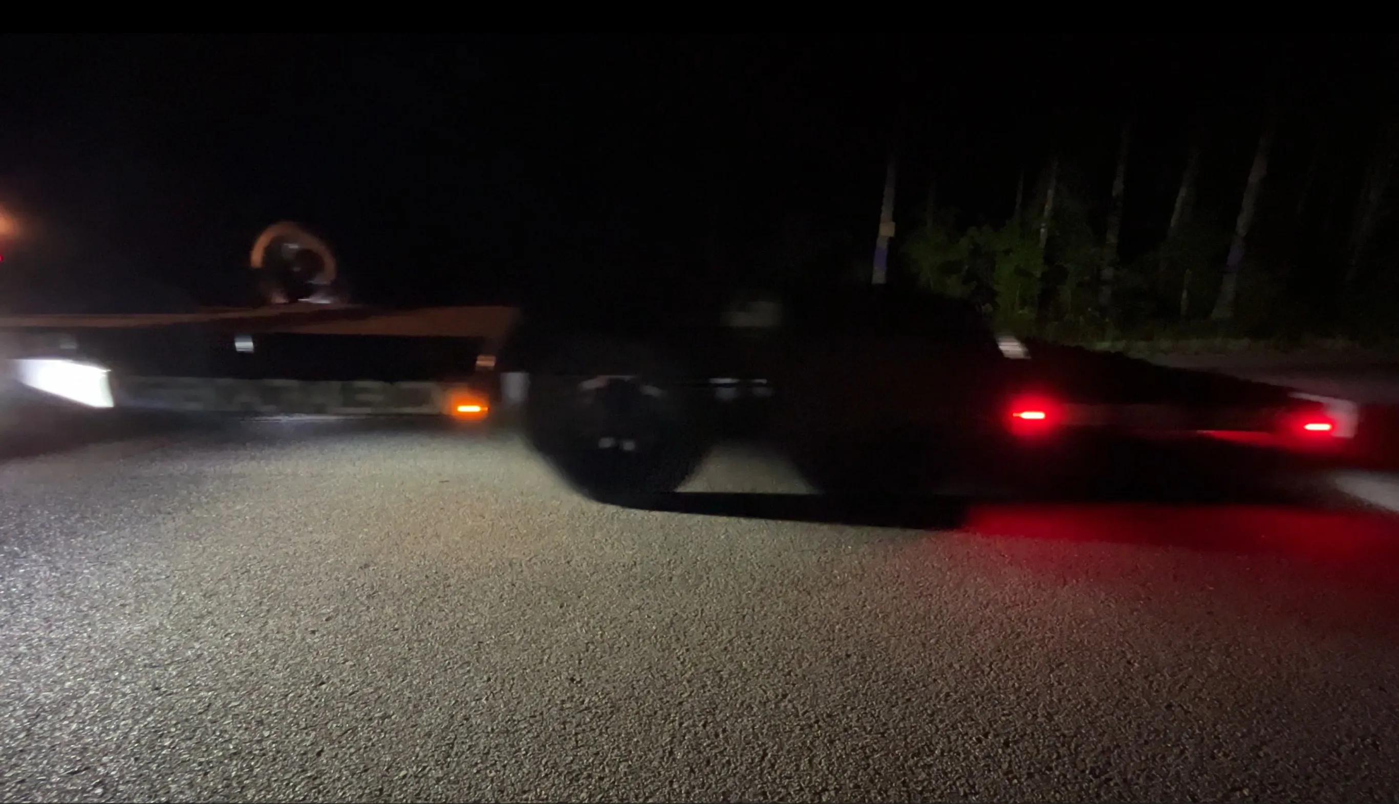 ACG Rental Trailer car hauler illuminated with added reverse lighting at night in North Carolina