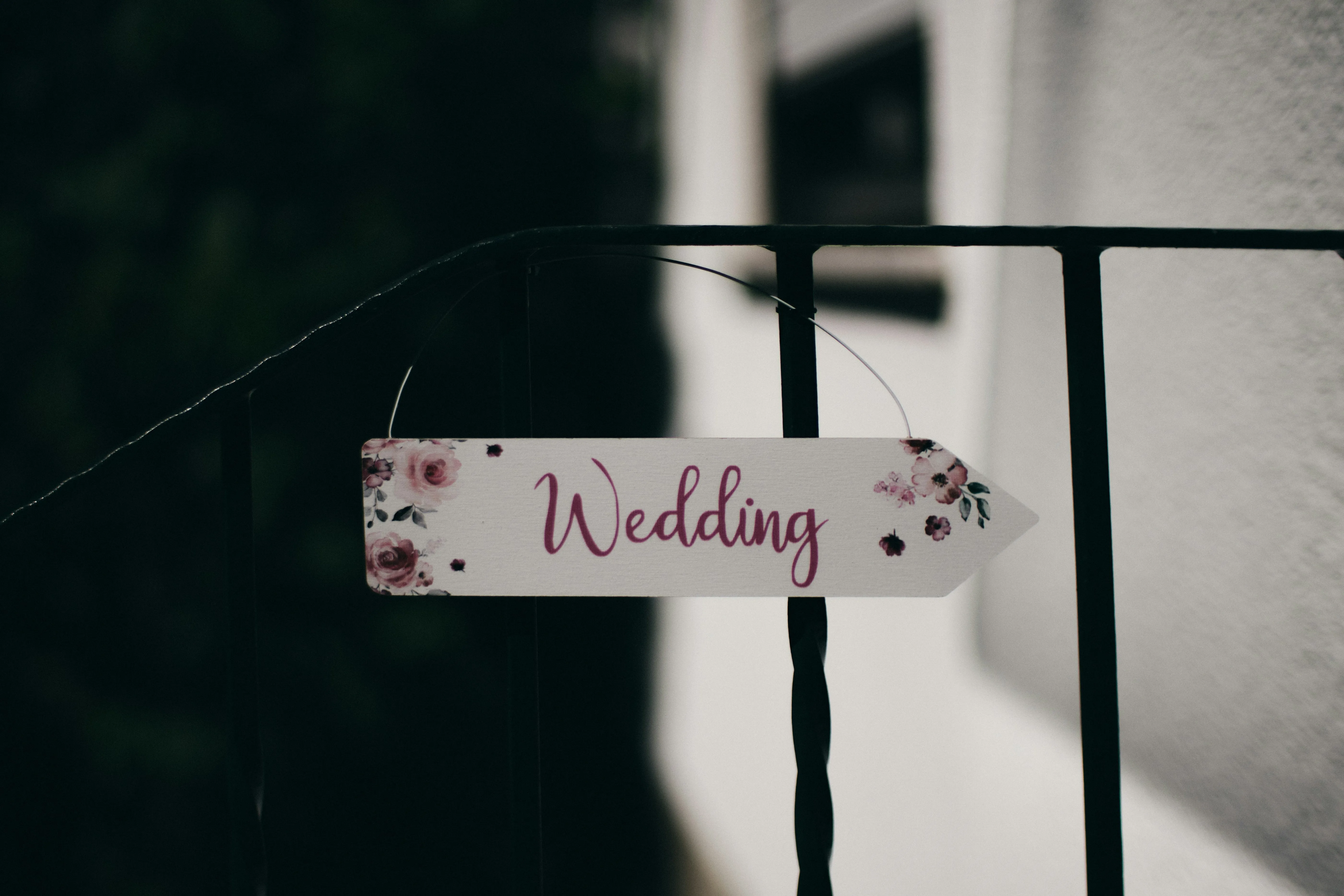 Wedding sign pointing to the door