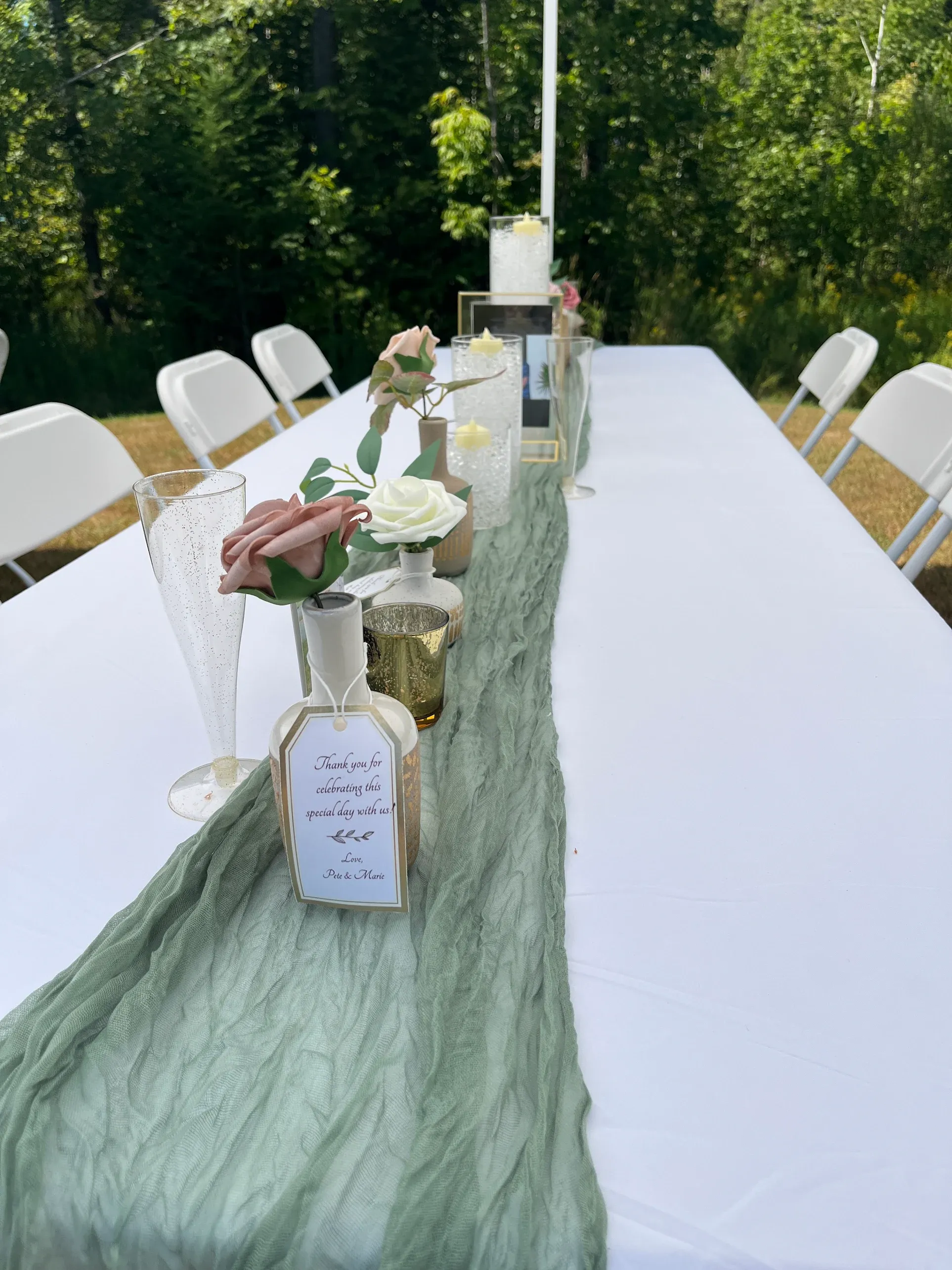 A wedding setup with tables and chairs