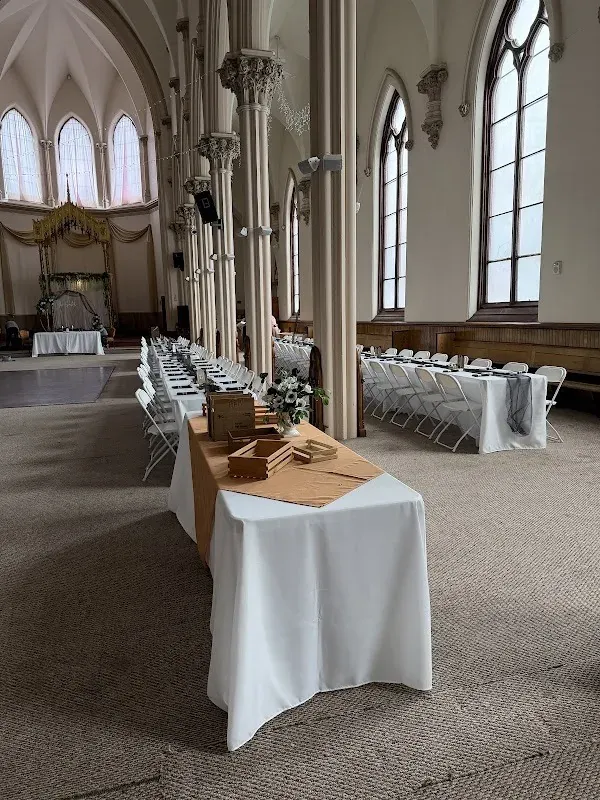 Wedding with tables with white tablecloths and chairs