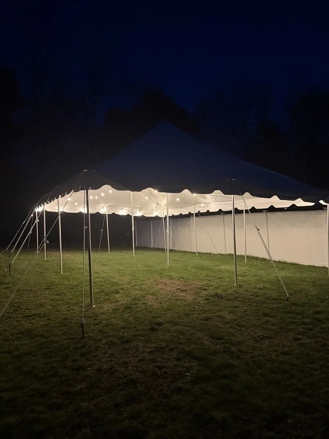 20x30 pole tent with string lights