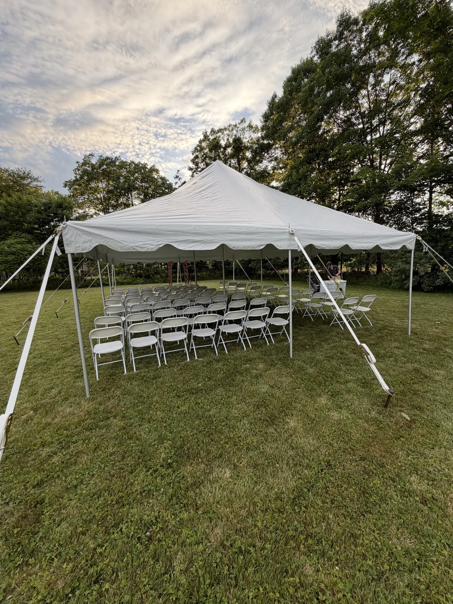 20x30 pole tent setup for a ceremony