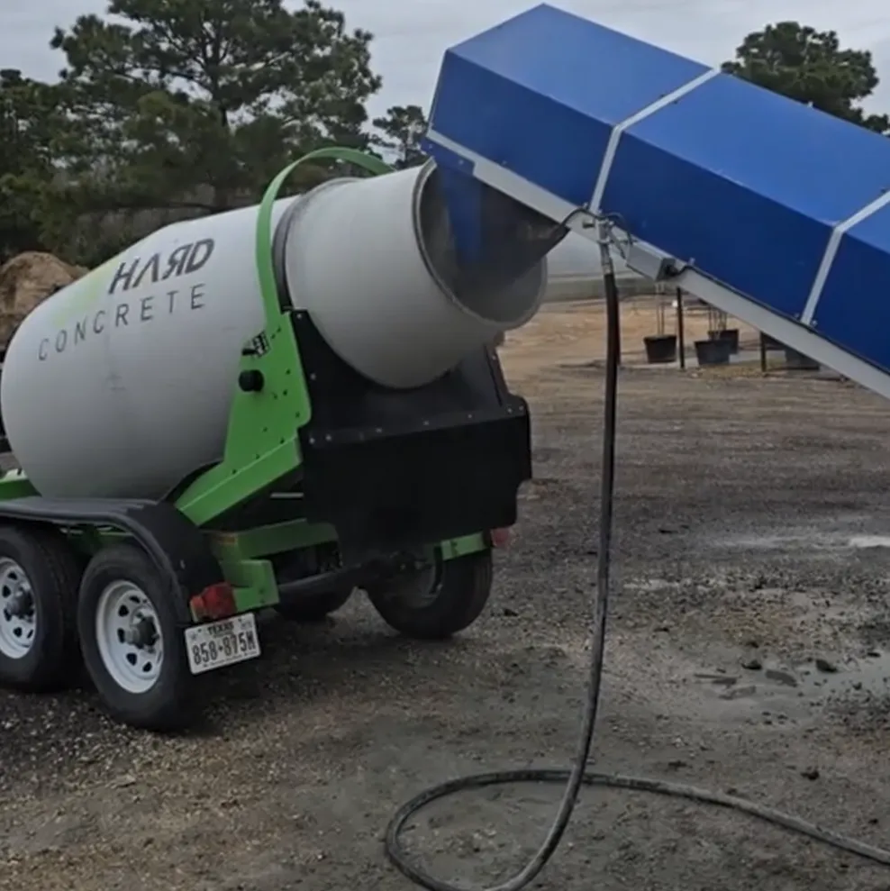 Ready Mix Concrete Trailer being filled with concrete