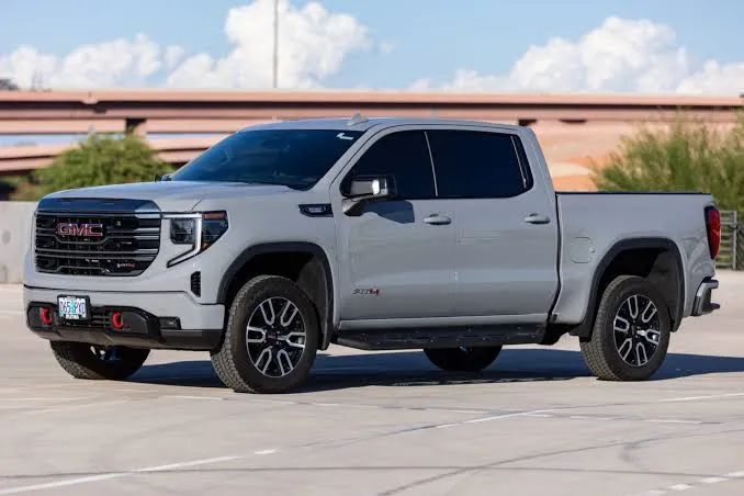 Gray GMC Sierra used by KC Quality Rentals for local tote delivery