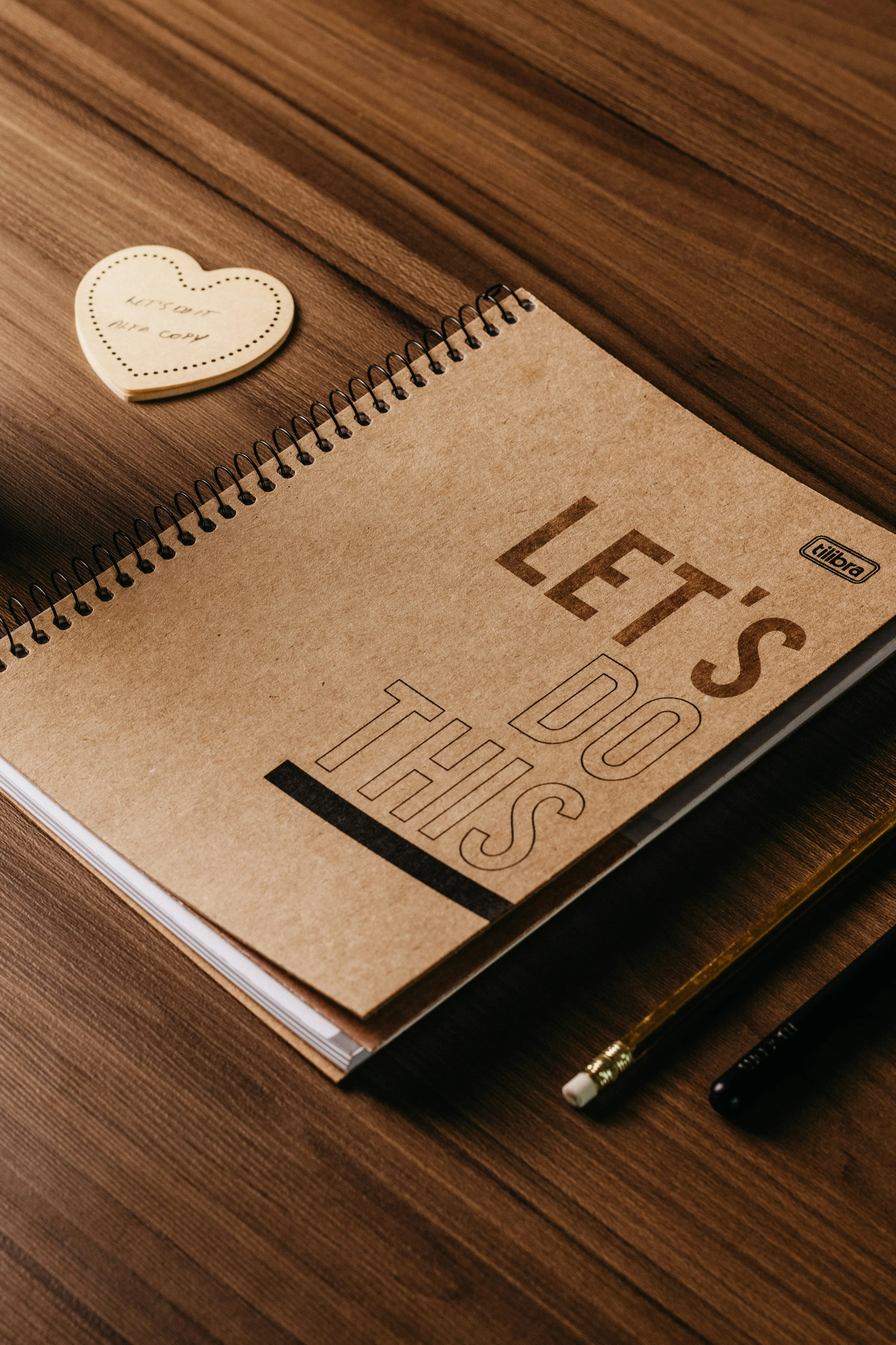 Notizbuch mit der Aufschrift „Let's do this“ – Feier und Budget planen