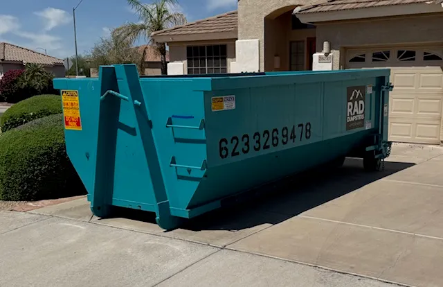 15 yard dumpster in driveway