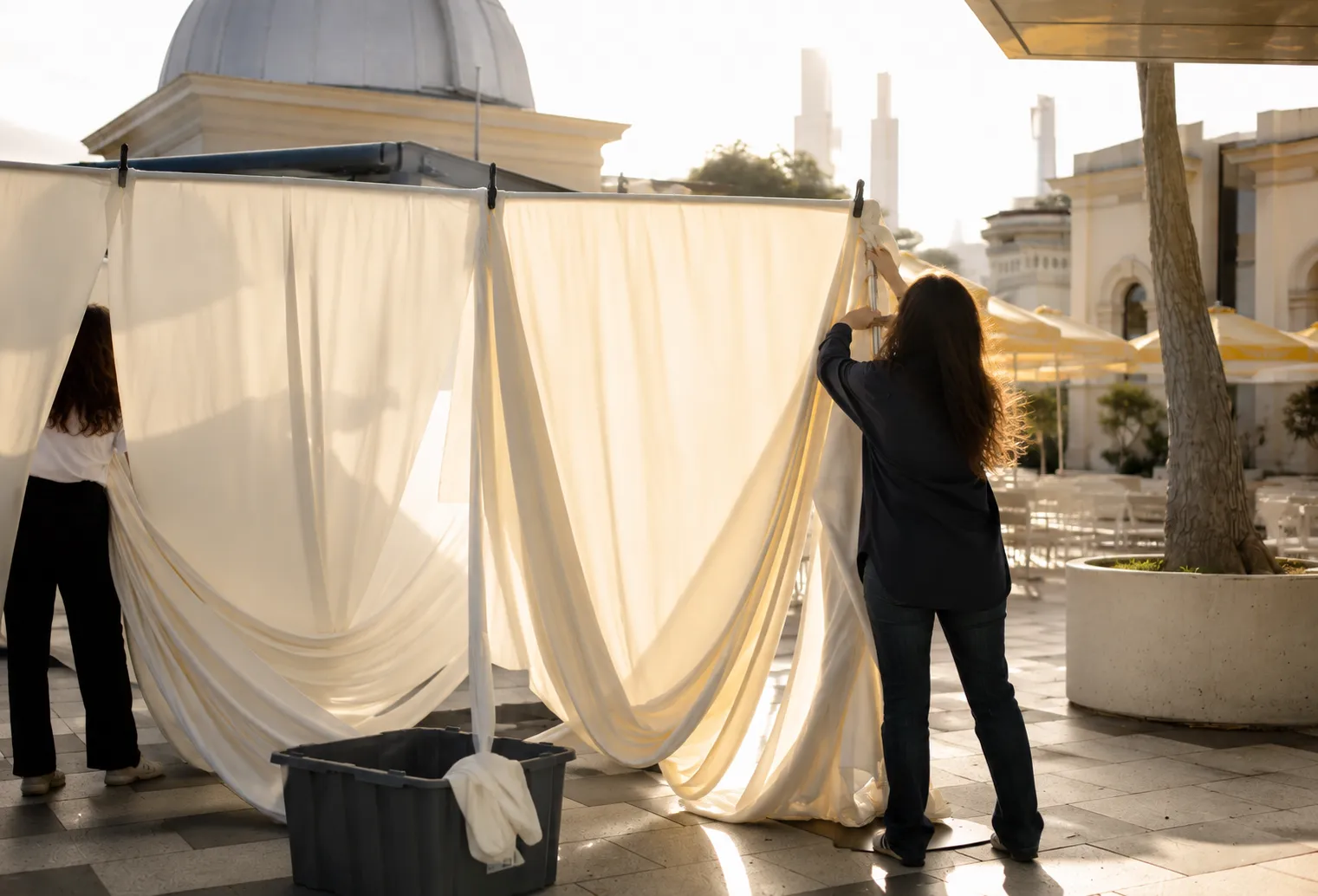 Behind the scenes installation of outdoor event drapery at The Observatory Melbourne by Miss Events Melbourne