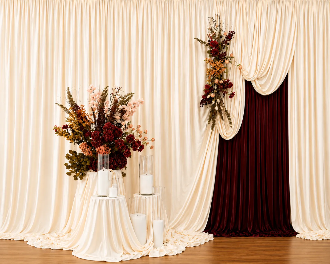 Ivory drapery backdrop spiced amber peek, cascading florals, layered fabric plinths and candle styling for a luxury Melbourne wedding