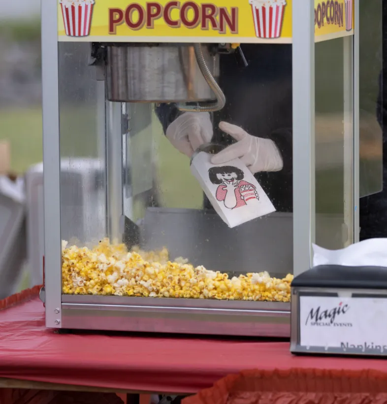 "Get the perfect treat for your event with Carnival Guy's popcorn machine rental in Topeka. Fresh, hot, and delicious - our popcorn machines make any celebration unforgettable. Book now!