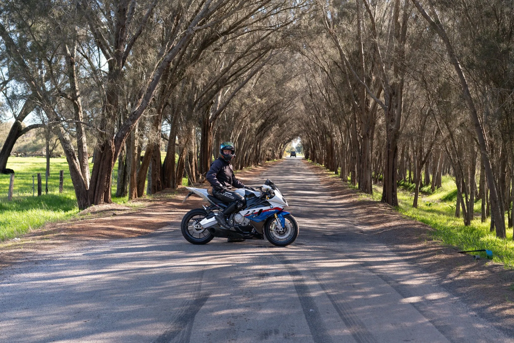 BMW S1000RR superbike with rider — premium motorcycle rental in Perth and Melbourne, Australia