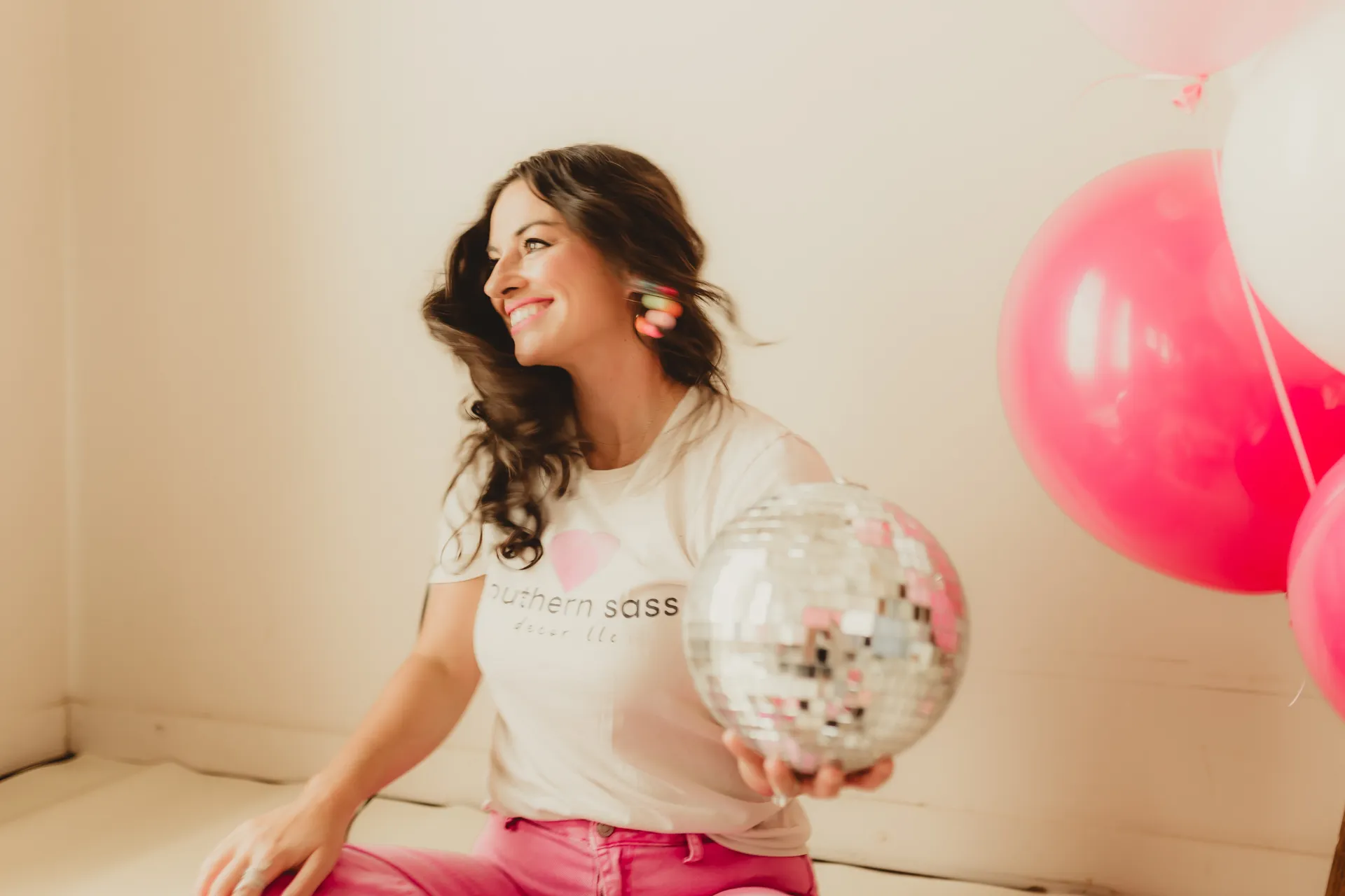 Party rental in Lafayette Louisiana owner Danielle with balloons