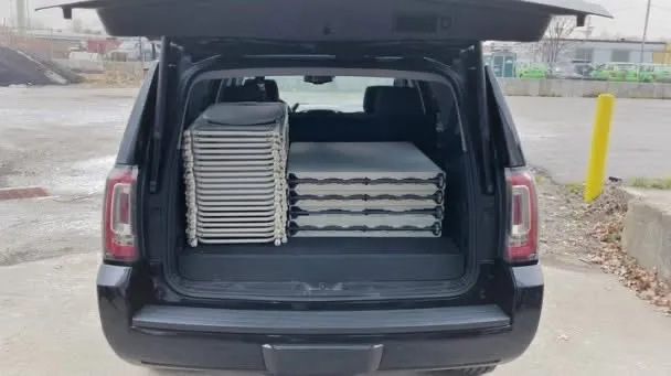 picture showing tables and chairs in a car