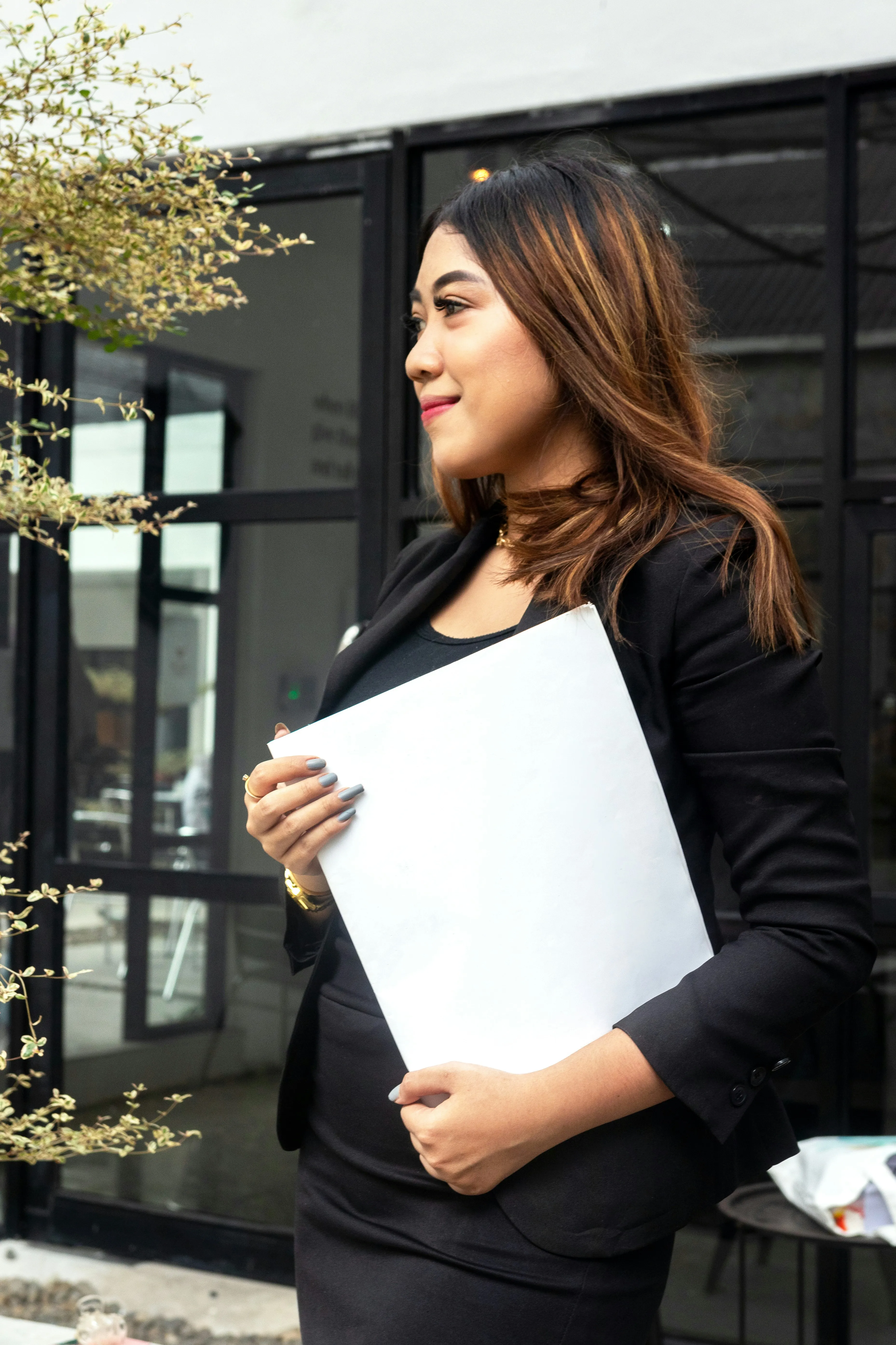 Event coordinator holds clipboard 
