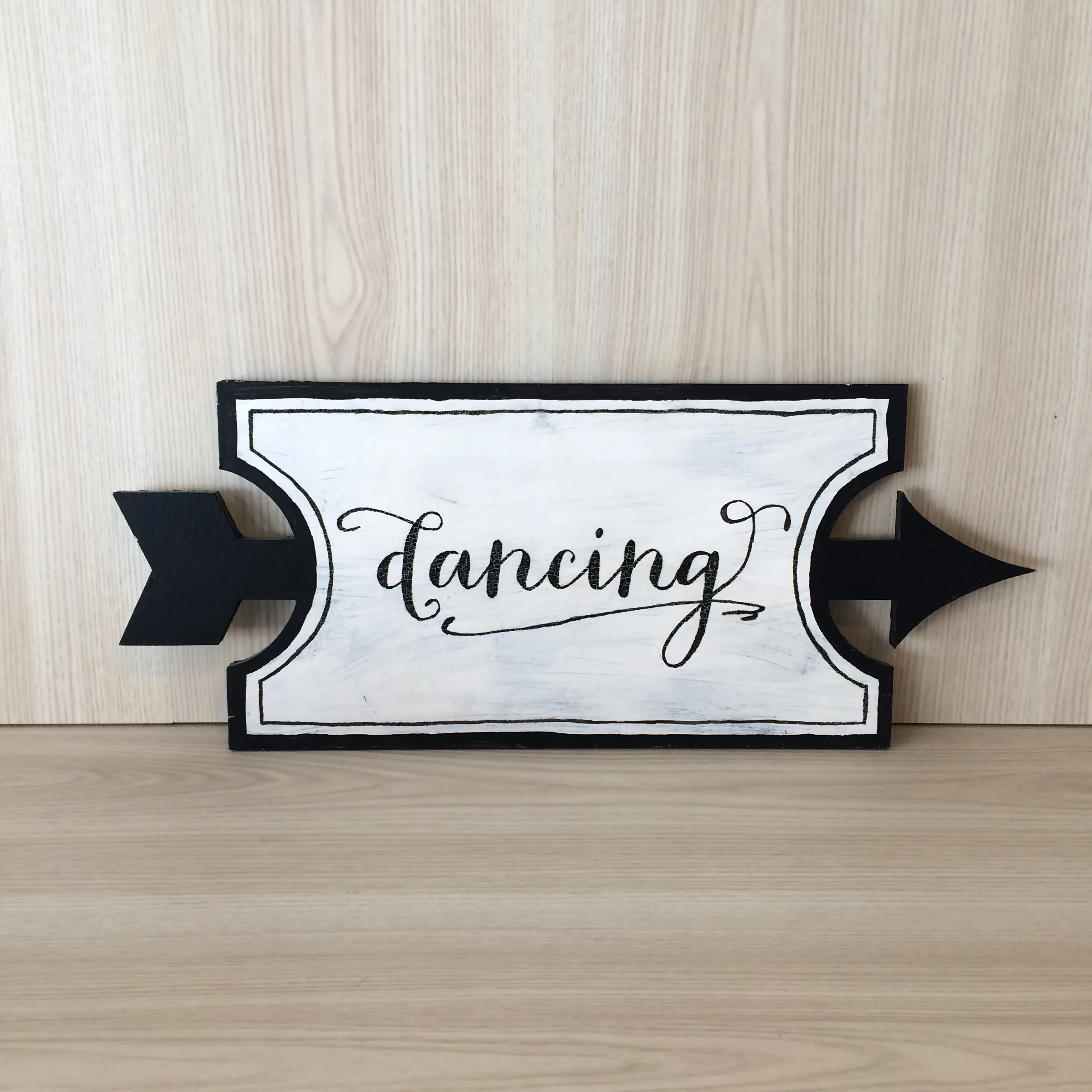 Dancing Arrow Wooden Sign
