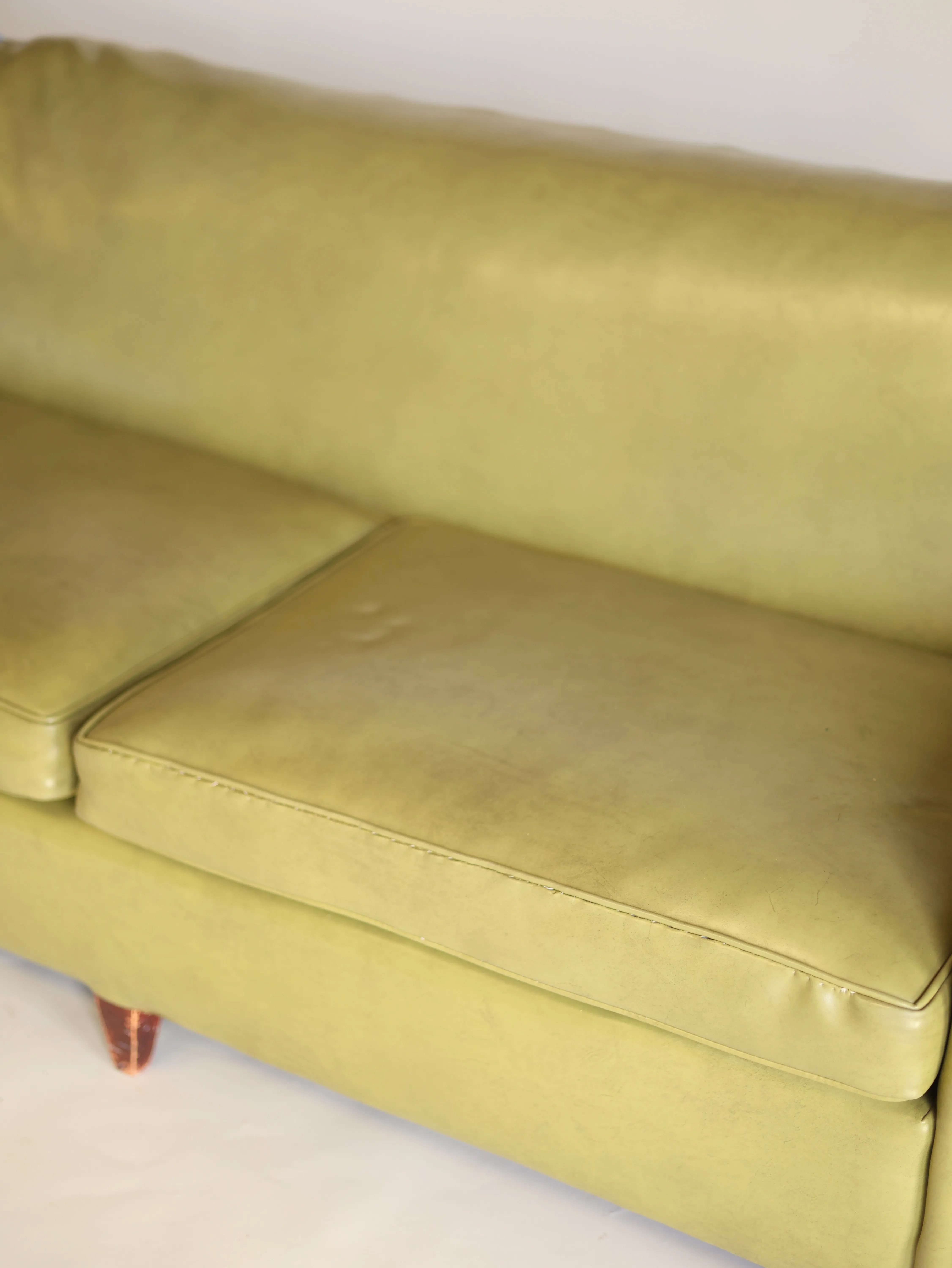 Henry Faux green leather sofa