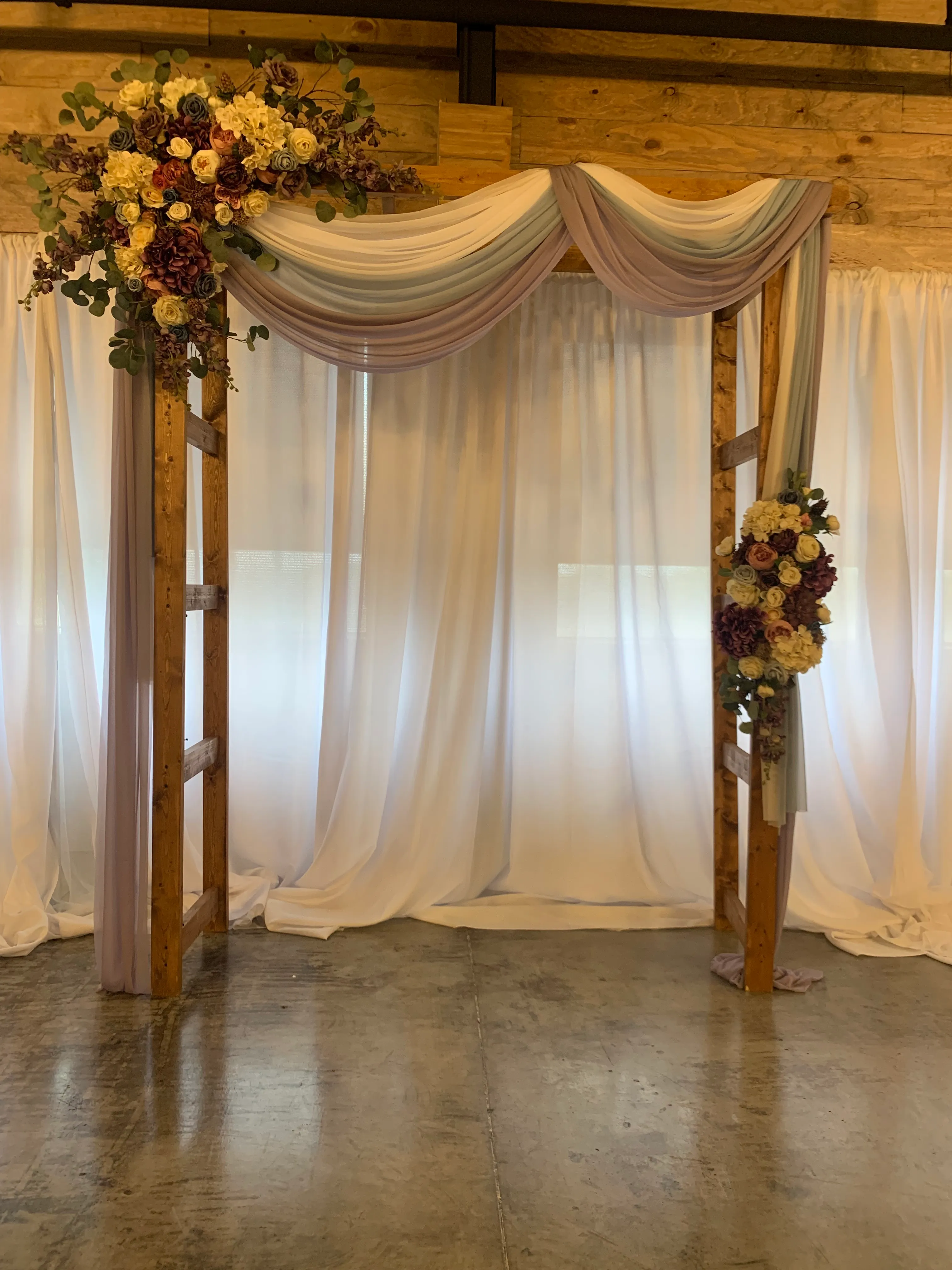 Purple and magenta arch swags