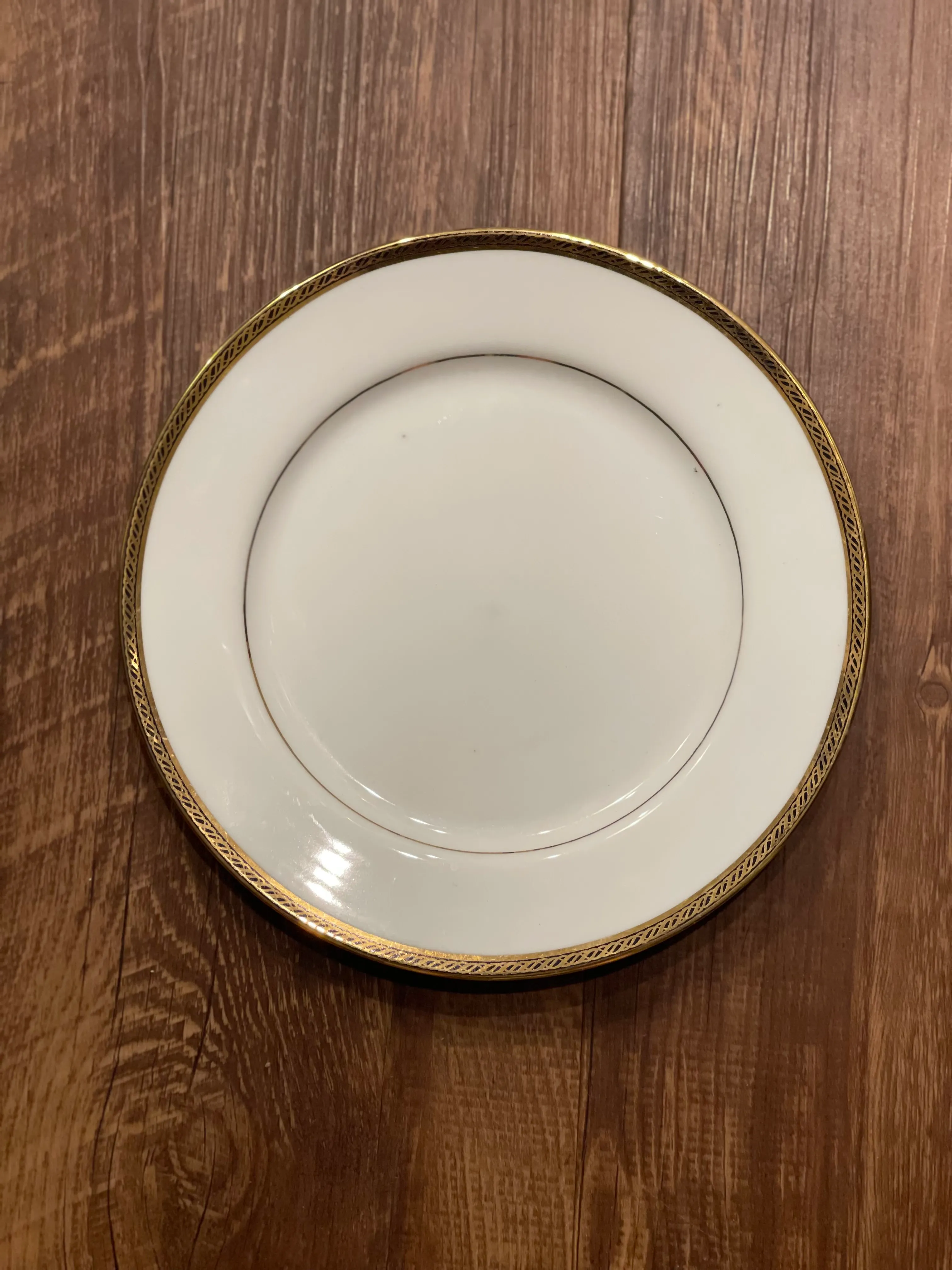 White Dinnerware w/a beautiful mix of Gold Trim 