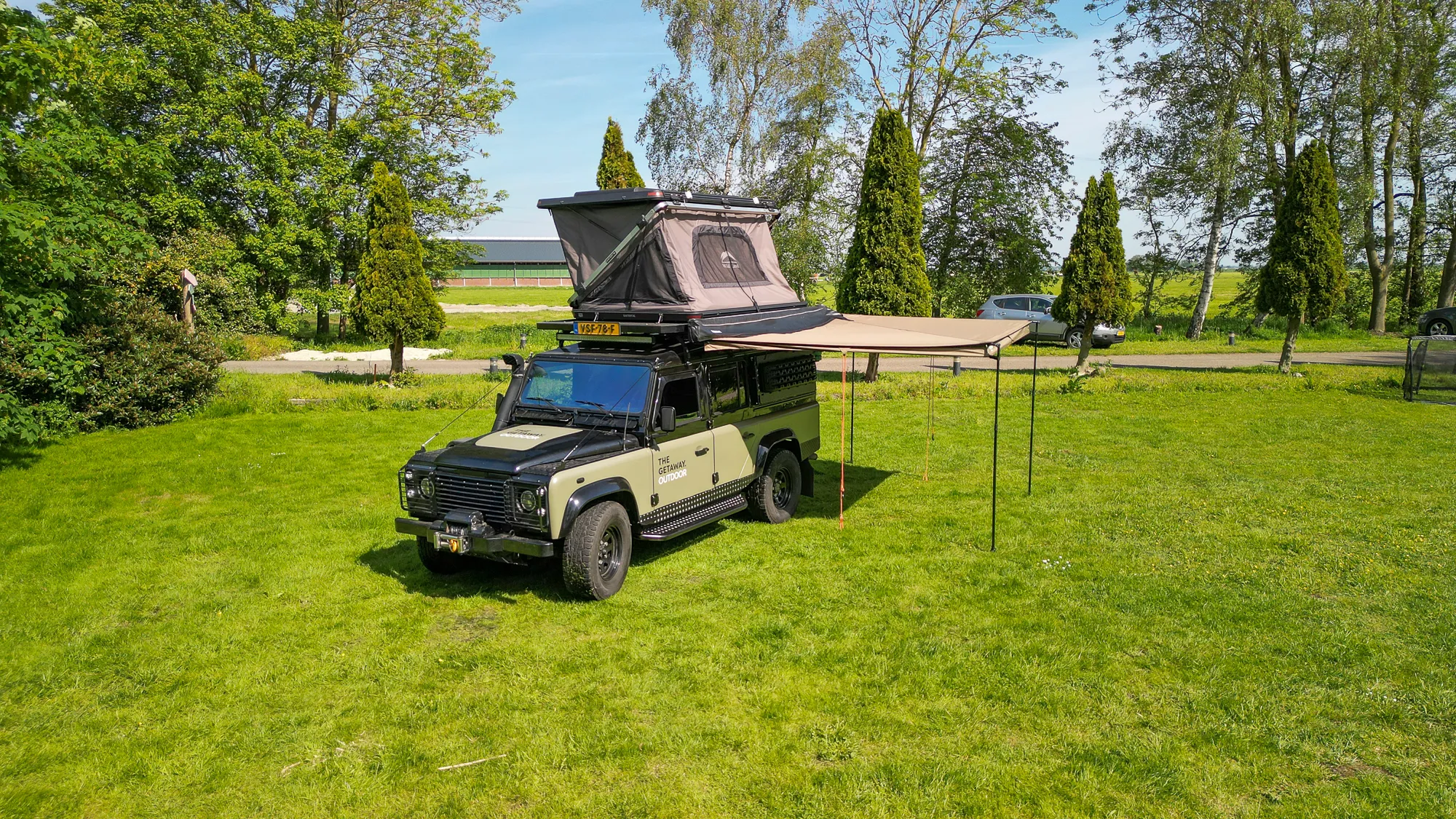 Defender met daktent