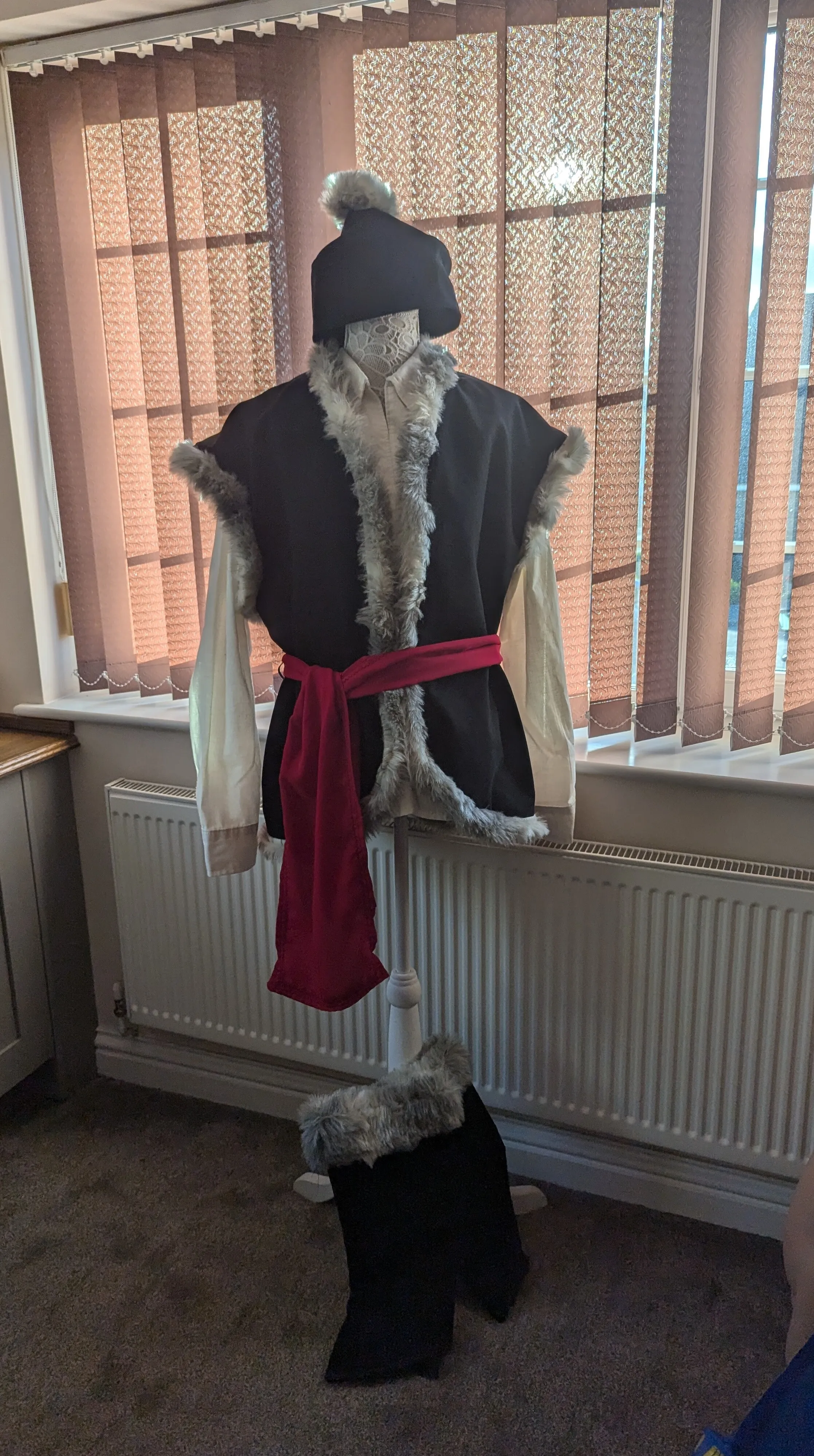 Kristoff Frozen costume with boot covers, red sash and hat