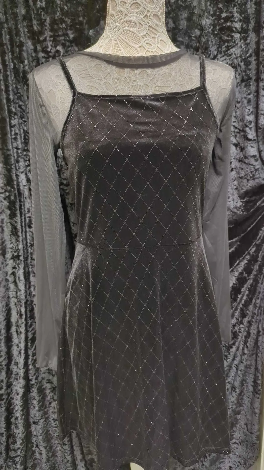 Black dress with diamantés and black net long sleeved top