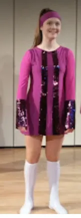 Purple A-line style motown dress with matching head band and white boot covers