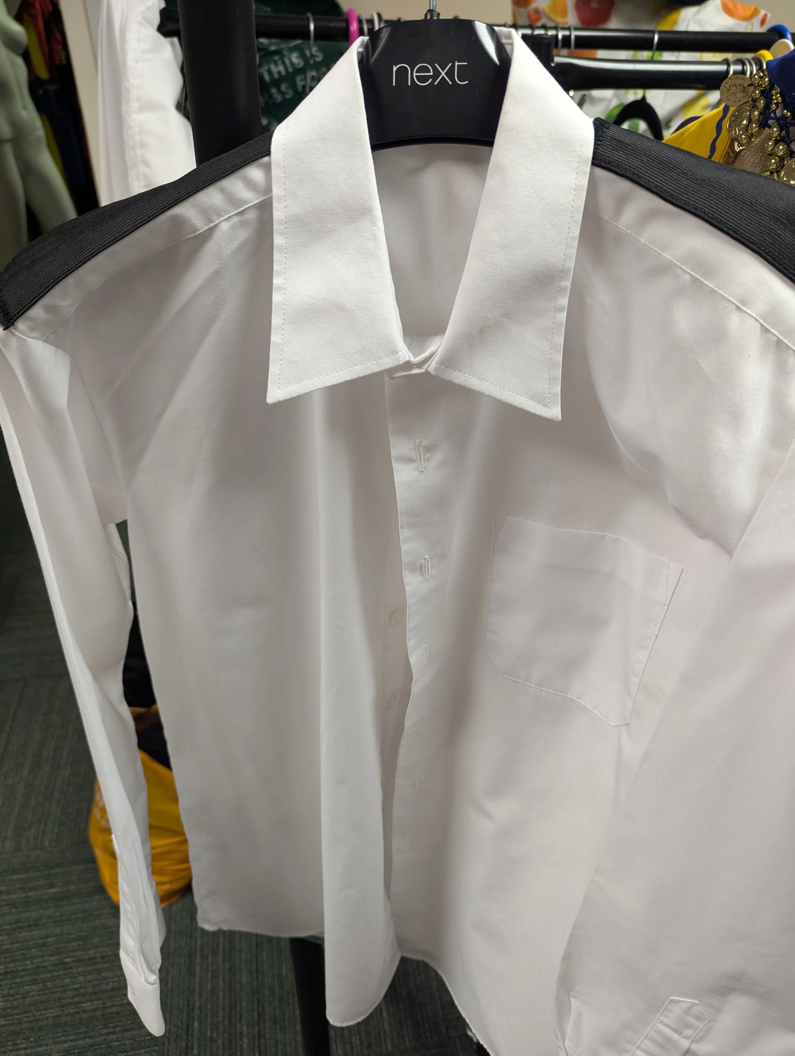 White long sleeved shirt with black epaulettes - used for Dog catcher in Annie