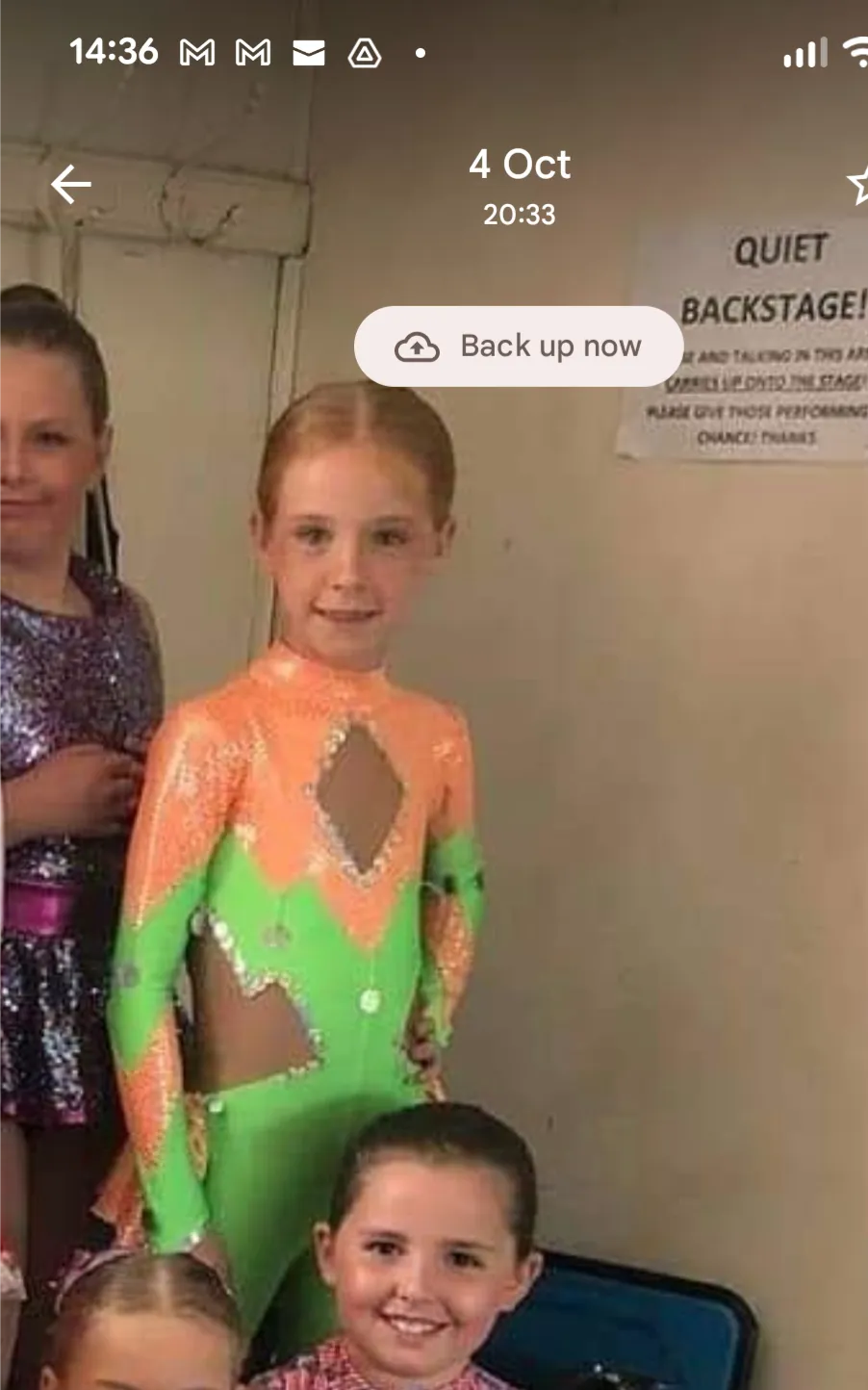 Orange and green cat suit