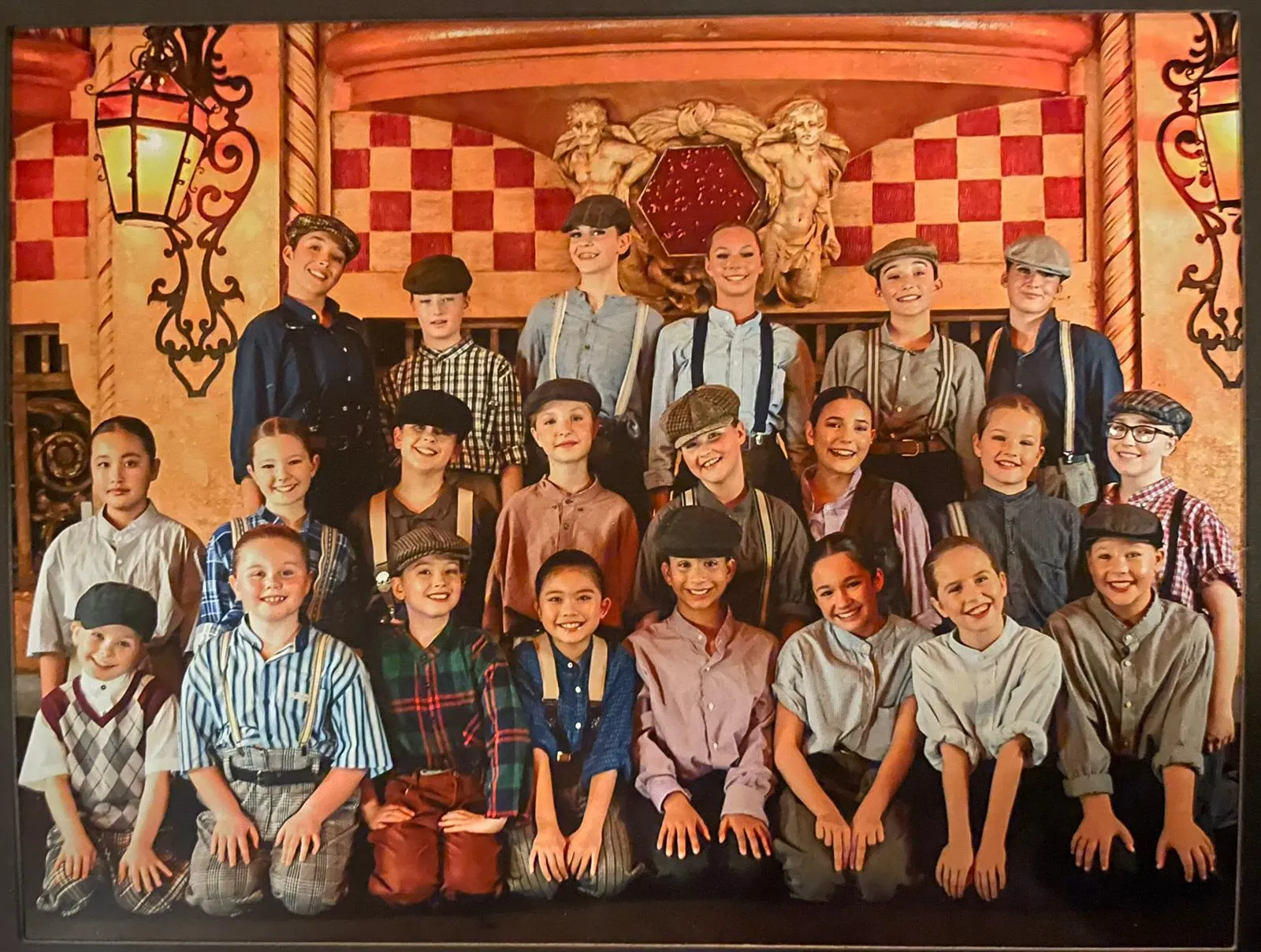 Newsies costumes - various shirts, trousers, braces, flat caps and waistcoats