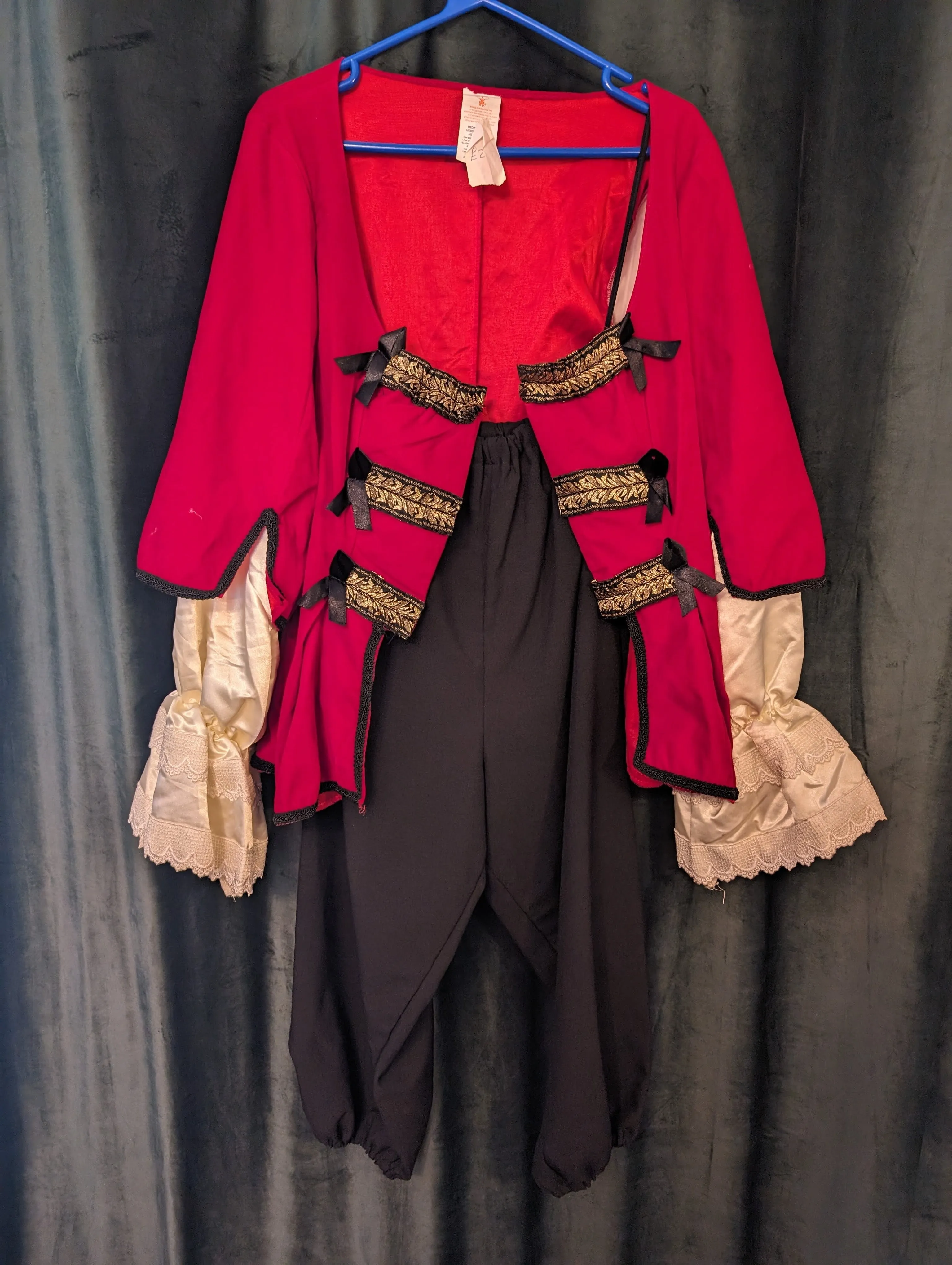 Period style red jacket with black pantaloons 