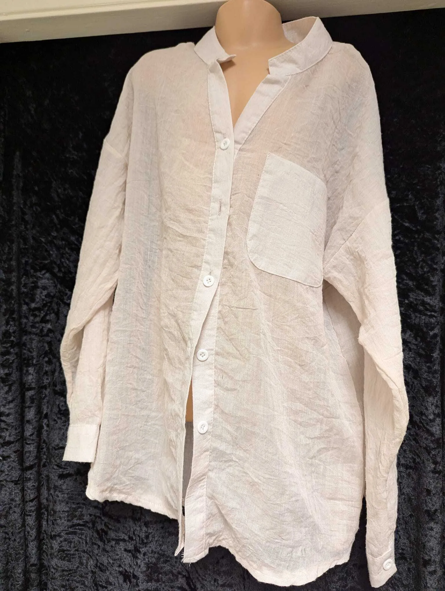 Ragged beige shirts for orphans, Schindlers List, Slaves etc