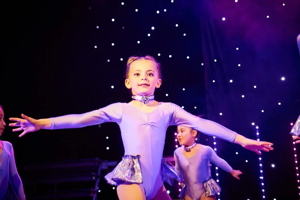 Purple leotard with half skirt attached and matching choker