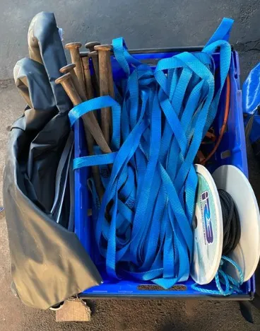 Box of Metal Pegs and Rope for Gazebo Assembly