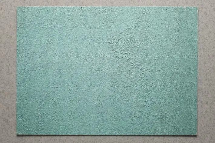 Green Painted Weathered Wall Background