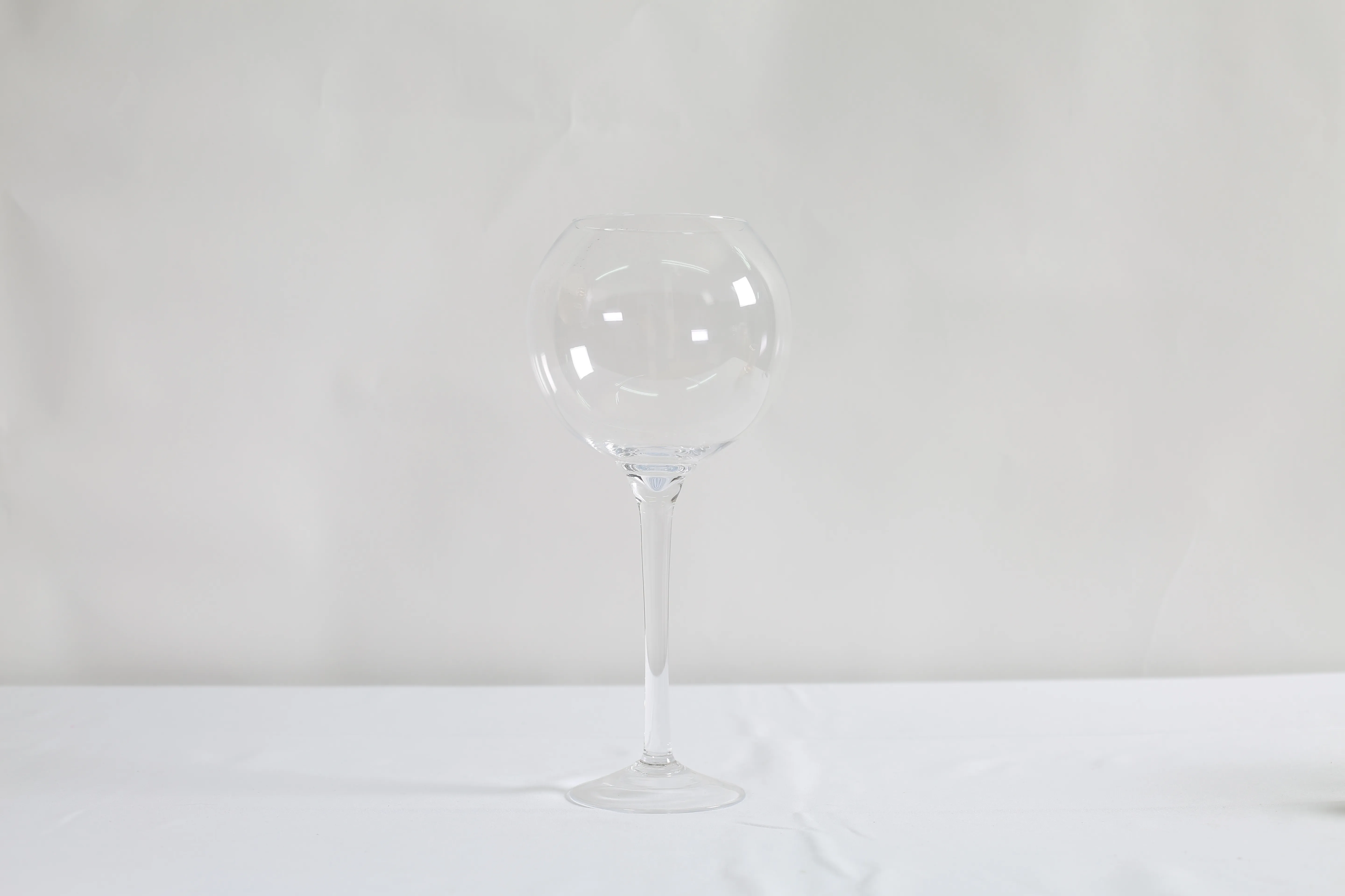 Round transparent candle jar on base