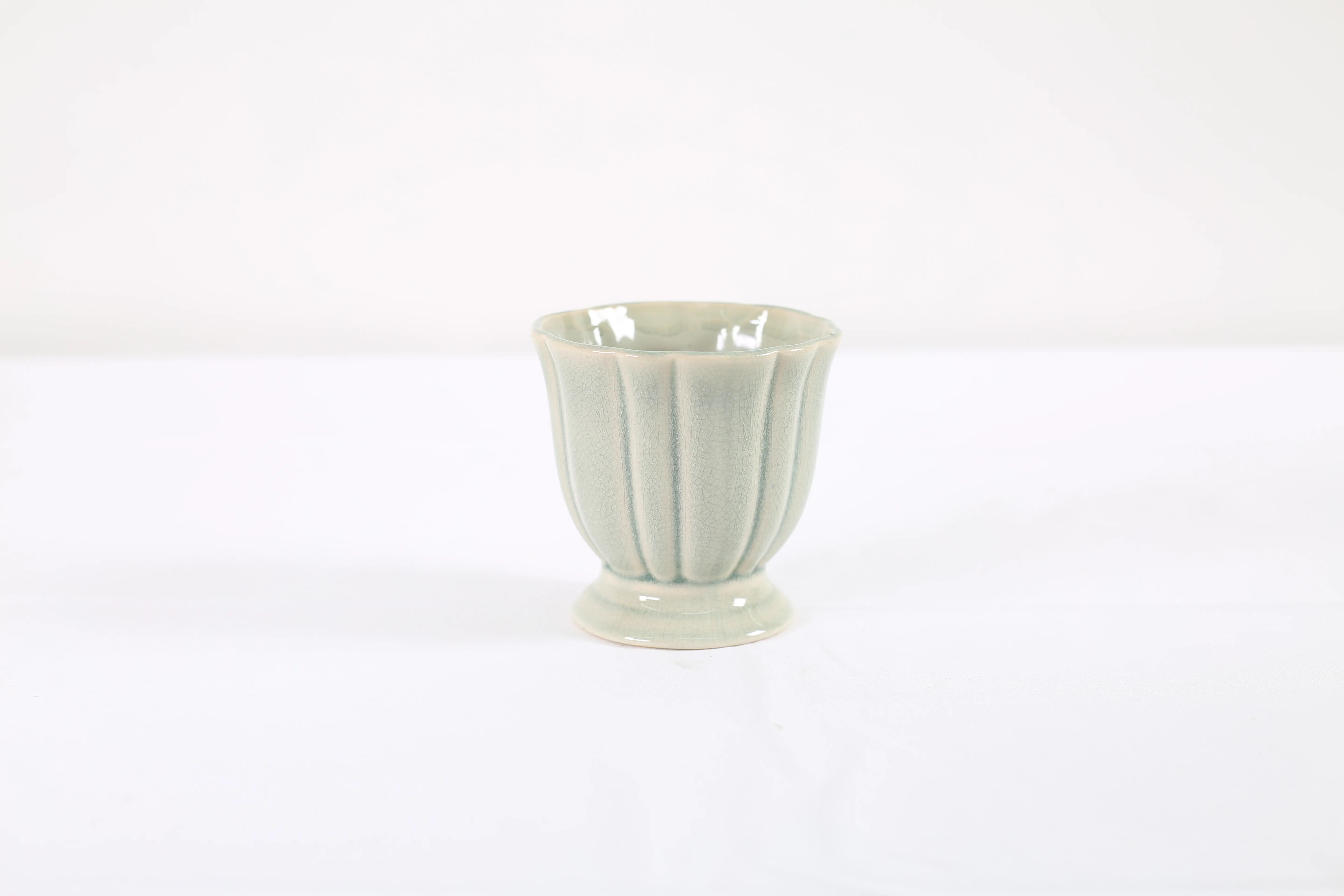 Green pottery vase