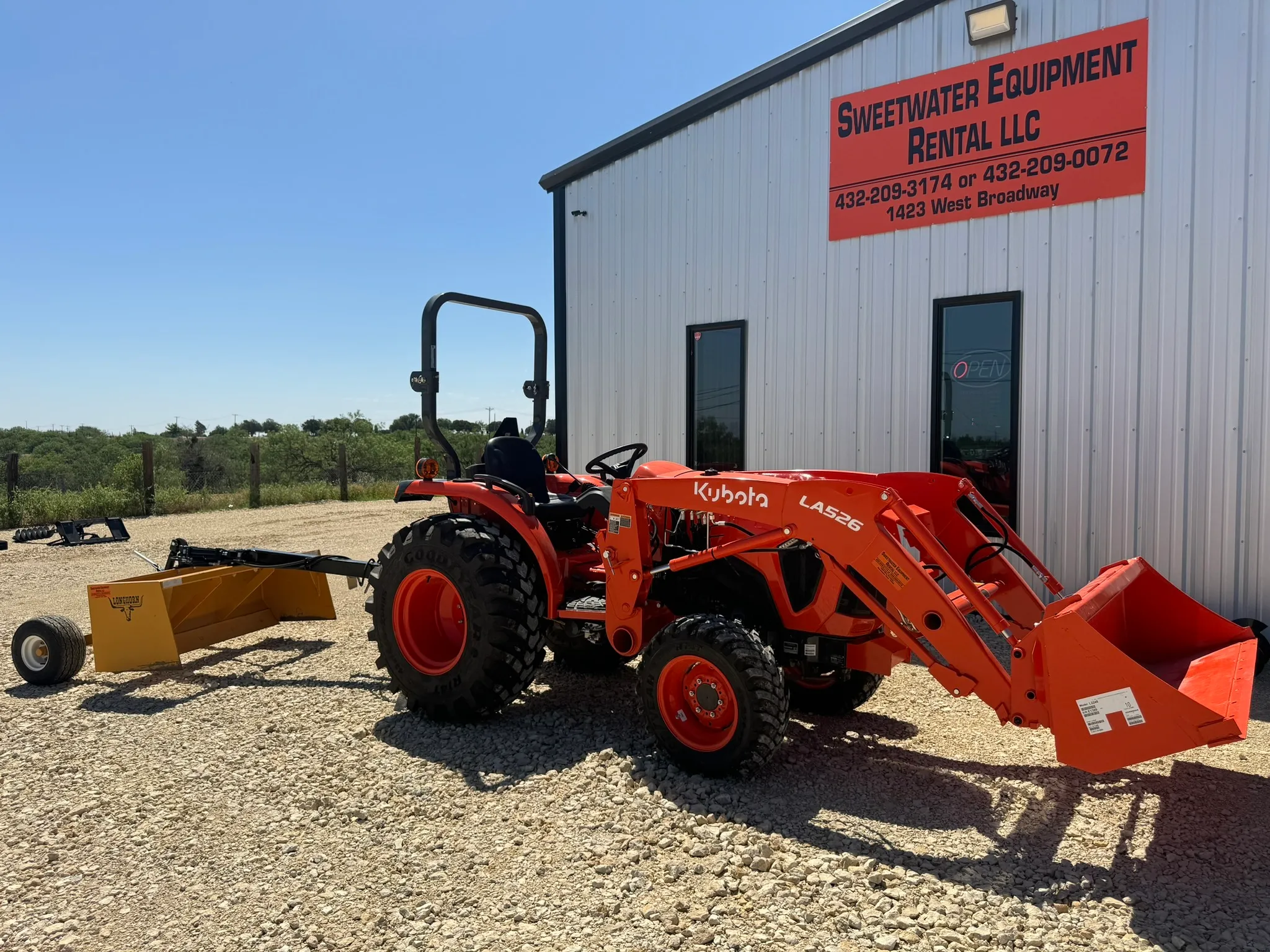  Tractor with 5 ft box scraper