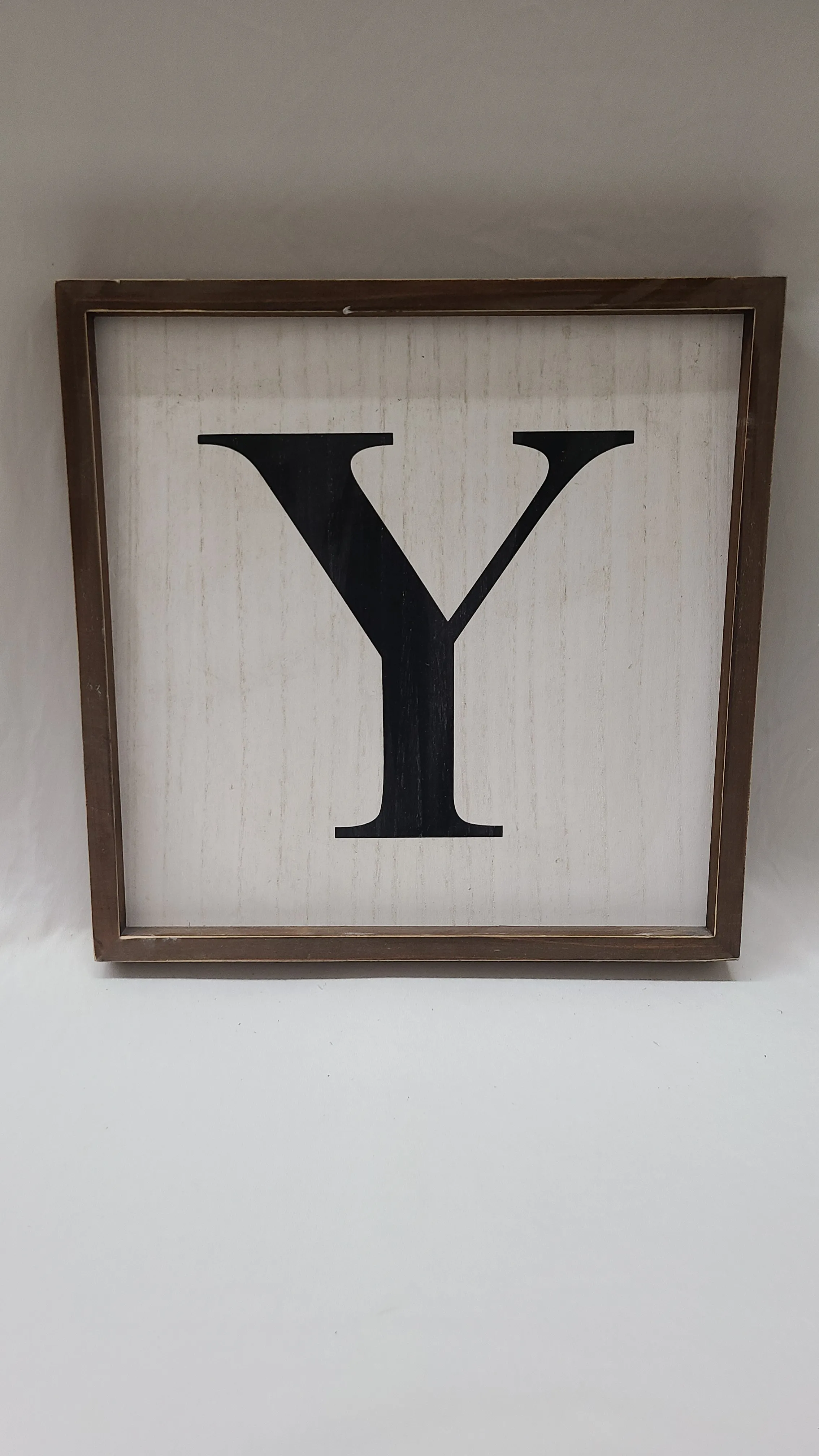 White Framed Y Sign