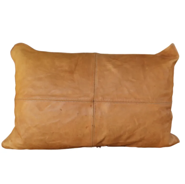 Tan leather lumber cushion