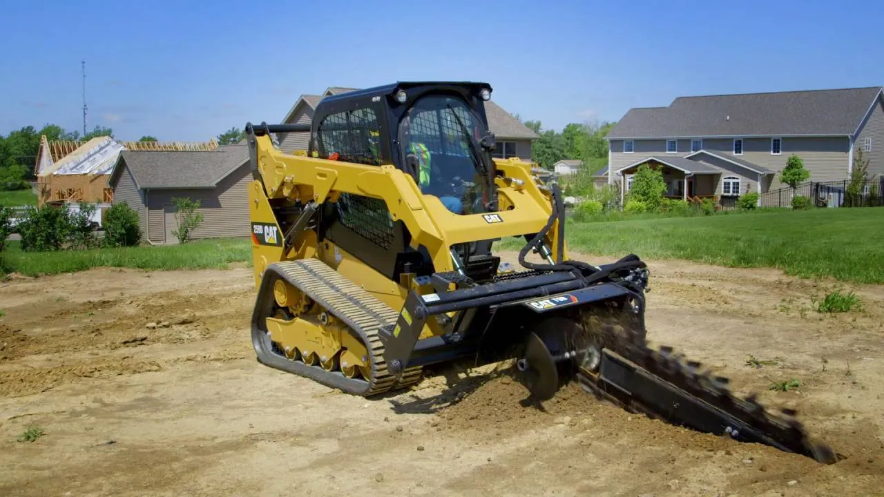  Skid Steer with trencher attachment
