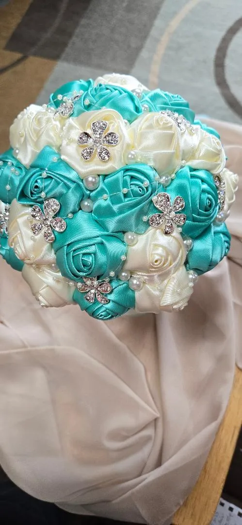 Light Turquoise Satin Rose Bouquet with Jewelry Embellishments 6 1/2 Inches wide