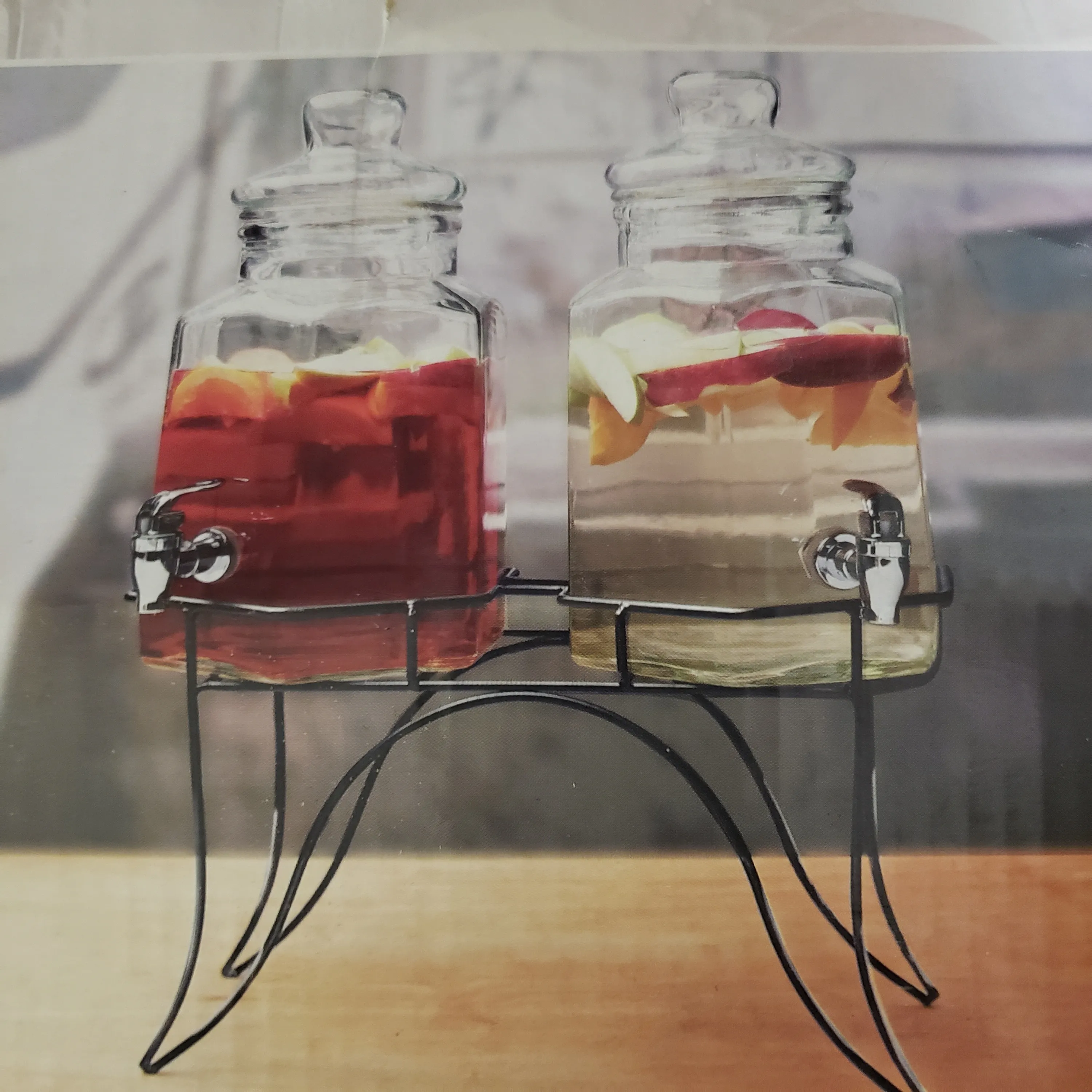 Small Drink Dispenser on Black Metal Stand