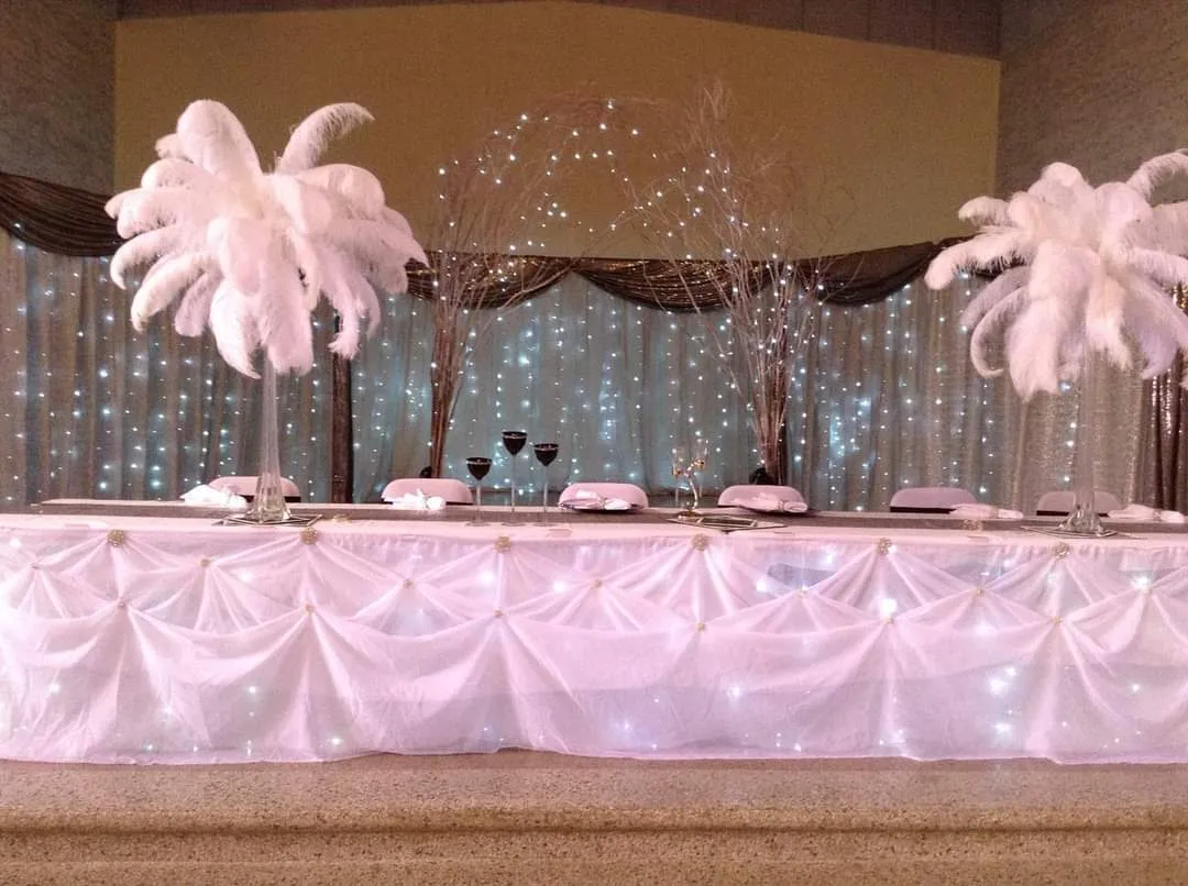 White Feather Centerpieces with Clear Tower Vases