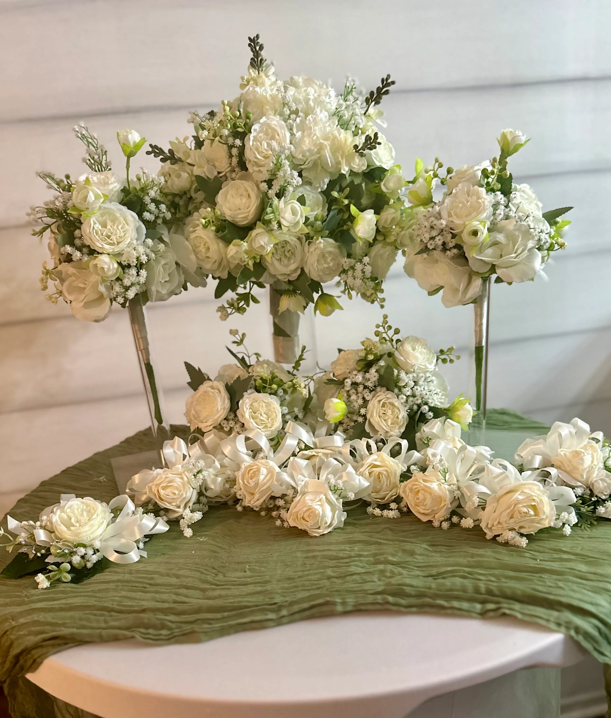 White Rose & Baby's Breath Boquets & Boutonniereseers