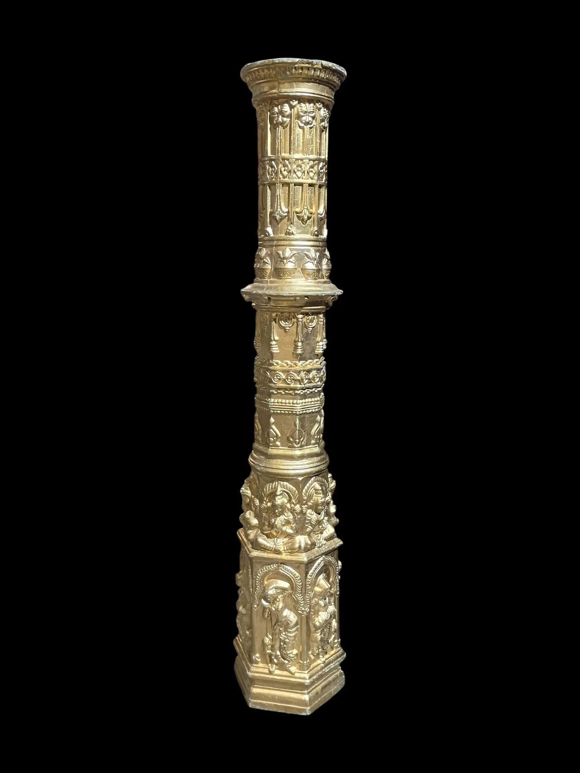 Gold Hex Pillar With Intricate Carvings