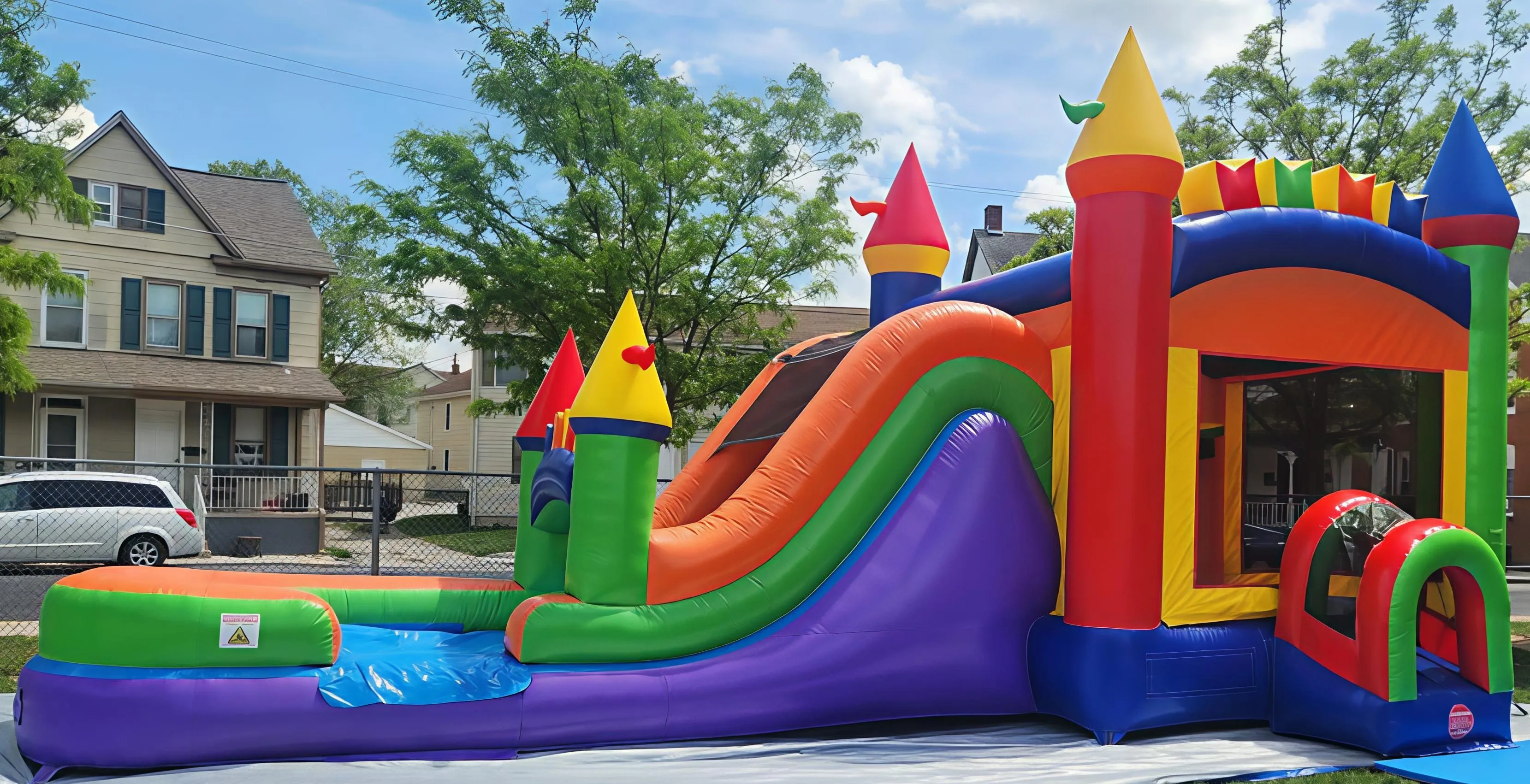 Inflatable- MEGA Rainbow Bounce House & Slide