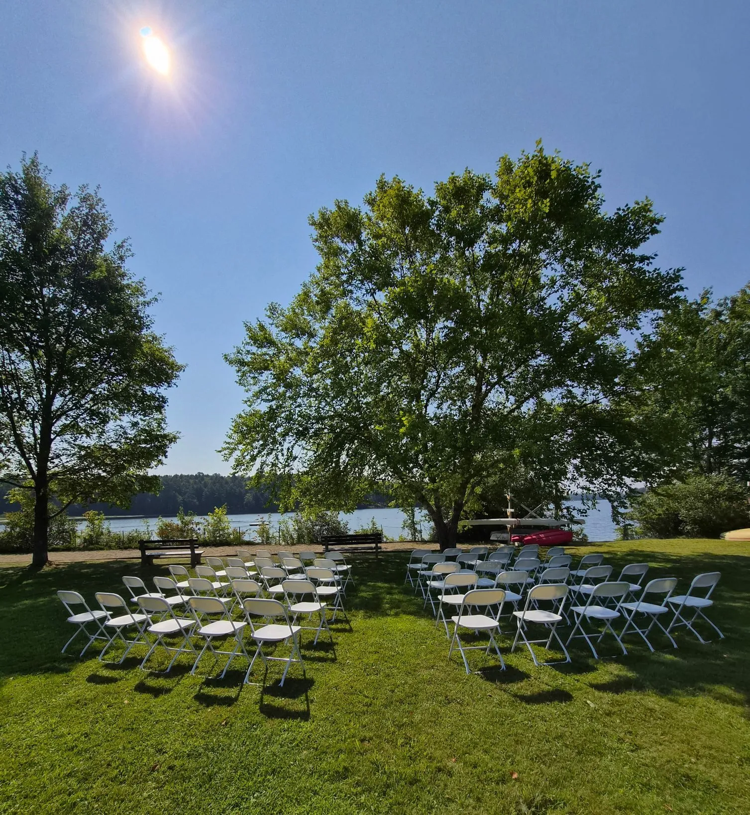 Event Rent Maine hosts a wedding ceremony by the lake.