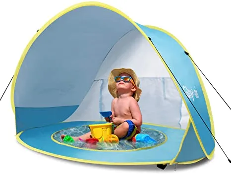 Beach pop-up tent with beach toys