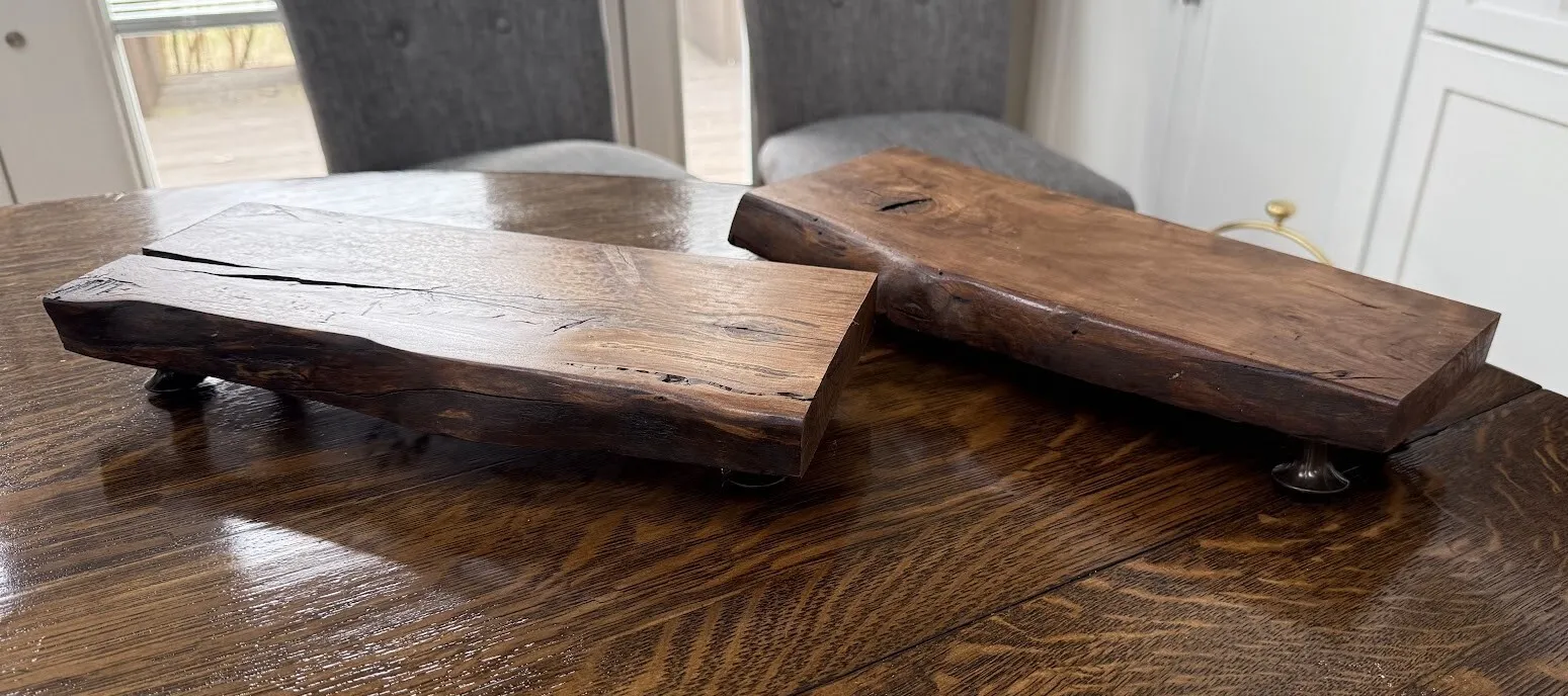 A set of two wood dessert displays